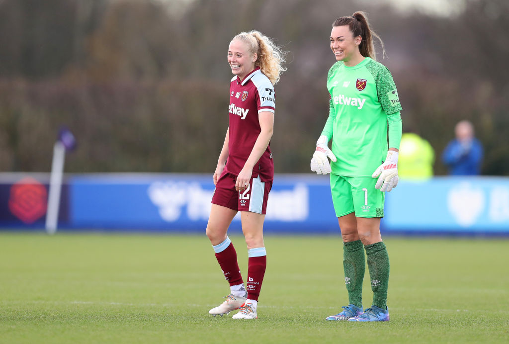 Grace Fisk and Mackenzie Arnold of West Ham United smile before the start of the second half during the Barclays FA Women's Super League match between Everton Women and West Ham United Women (Photo: GettyImages)