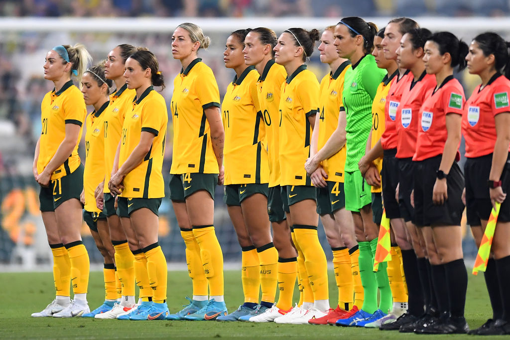 Australia line up for the national anthem before the International Women's match between the Australia Matildas and the New Zealand Football Ferns at Queensland Country Bank Stadium on April 08, 2022 in Townsville, Australia. (Photo by Albert Perez/Getty Images)