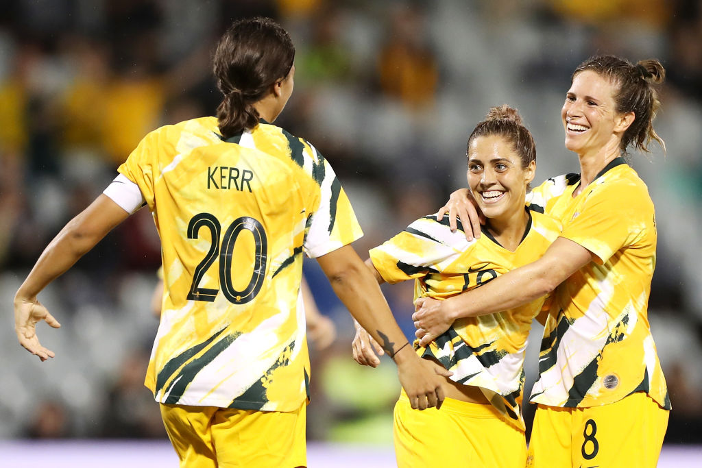 Katrina Gorry of the Matildas celebrates with her team mates Sam Kerr and Elise Kellond-Knight of the Matildas after scoring a goal during the Women's Olympic Football Tournament Qualifier match between the Australian Matildas and Chinese Taiepi at Campbelltown Sports Stadium on February 07, 2020 in Sydney, Australia. (Photo by Mark Kolbe/Getty Images)
