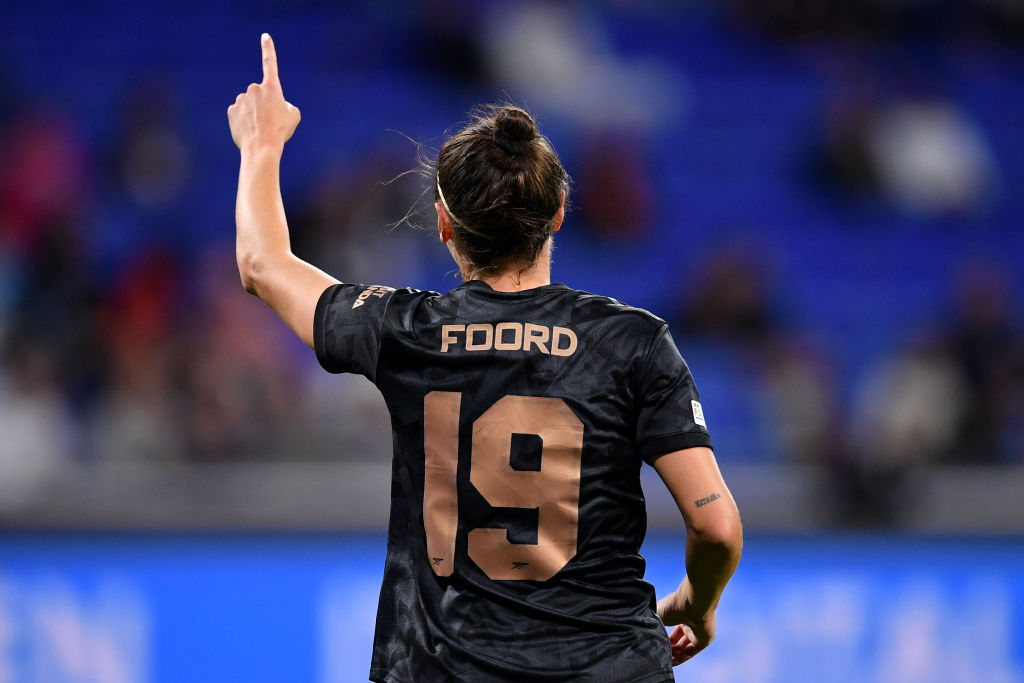 Caitlin Foord of Arsenal celebrates after scoring their sides first goal during the UEFA Women's Champions League group C match between Olympique Lyon and Arsenal at Groupama Stadium on October 19, 2022 in Lyon, France. (Photo by Valerio Pennicino - UEFA/UEFA via Getty Images)