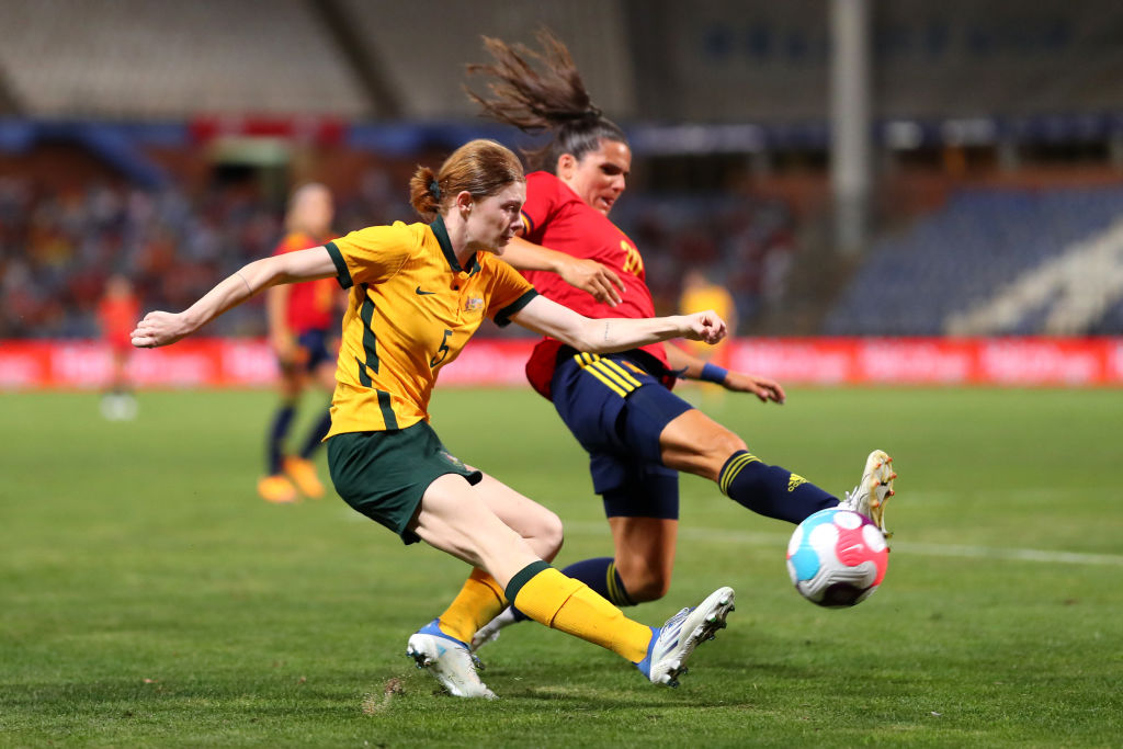 Cortnee Vine of Australia crosses the ball past Andrea Pereira of Spain during the Women's International Friendly match between Spain and Australia at Estadio Nuevo Colombino on June 25, 2022, in Huelva, Spain. (Photo by Fran Santiago/Getty Images) Cortnee Vine of Australia crosses the ball past Andrea Pereira of Spain during the Women's International Friendly match between Spain and Australia at Estadio Nuevo Colombino on June 25, 2022, in Huelva, Spain. (Photo by Fran Santiago/Getty Images)