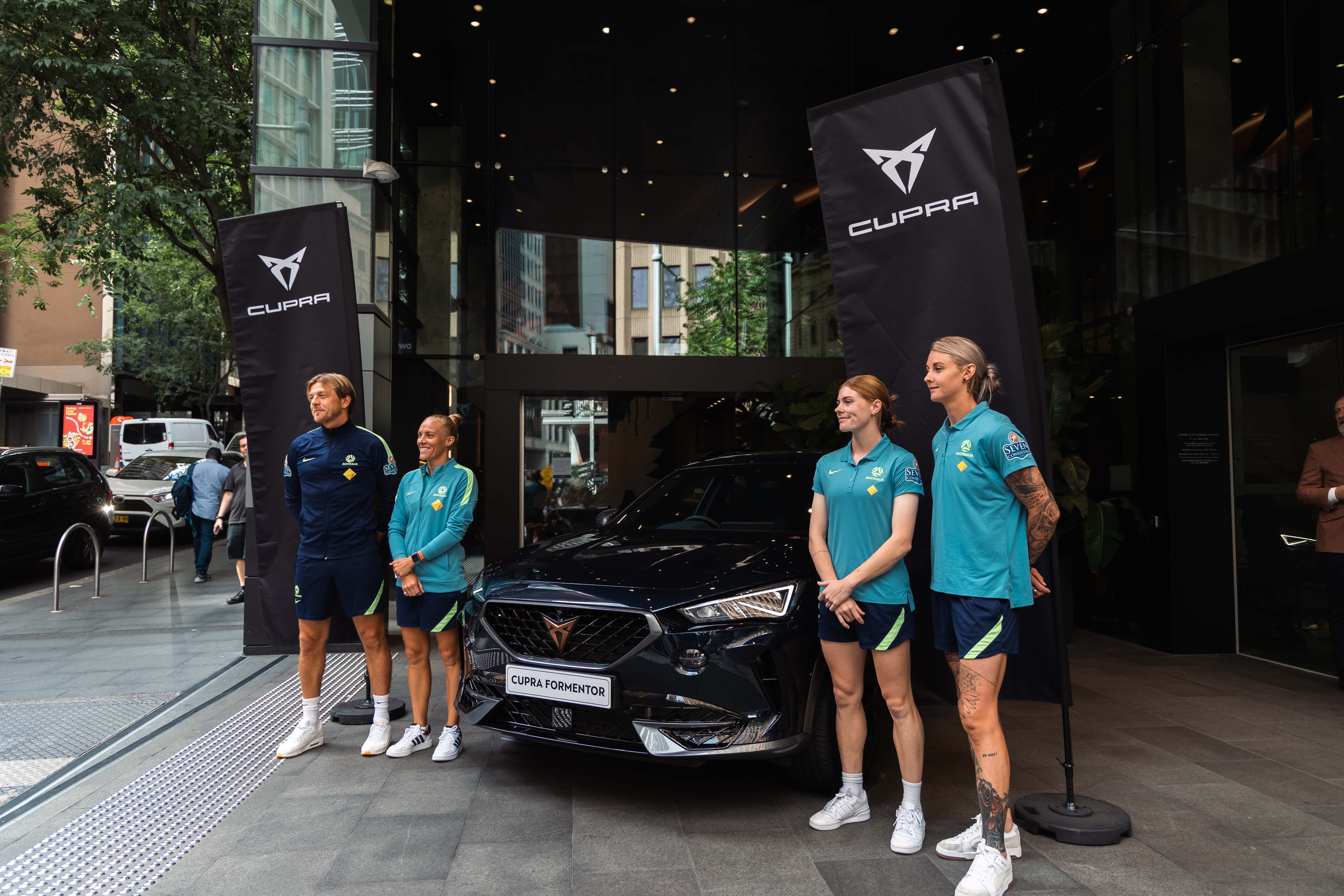 (L to R) Tony Gustavsson, Tameka Yallop, Cortnee Vine and Larissa Cummer after the Cup of Nations Squad Announcement at the CUPRA Garage in Sydney. (Photo: Marianna Galanopoulos/Football Australia)