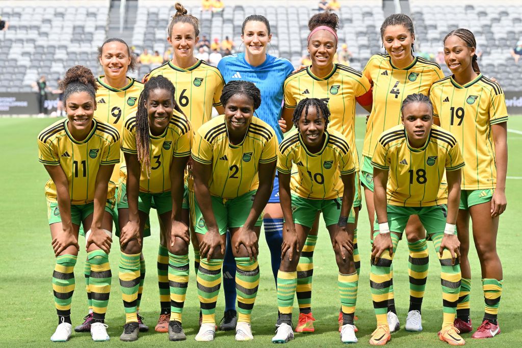 Jamaica players pose for a group picture prior to the start of the 2023 Cup of Nations women's football match between the Czech Republic and Jamaica at the CommBank Stadium in Sydney on February 19, 2023. - -- IMAGE RESTRICTED TO EDITORIAL USE - STRICTLY NO COMMERCIAL USE -- (Photo by SAEED KHAN / AFP) / -- IMAGE RESTRICTED TO EDITORIAL USE - STRICTLY NO COMMERCIAL USE -- (Photo by SAEED KHAN/AFP via Getty Images)