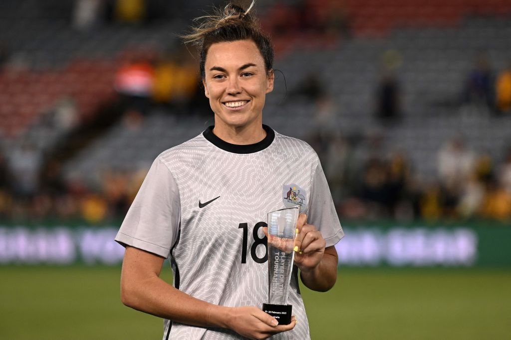 Australia's Mackenzie Arnold poses with her player of the competition award after the 2023 Cup of Nations womens football match between Australia and Jamaica in Newcastle on February 22, 2023. - -- IMAGE RESTRICTED TO EDITORIAL USE - STRICTLY NO COMMERCIA Australia's Mackenzie Arnold poses with her player of the competition award after the 2023 Cup of Nations womens football match between Australia and Jamaica in Newcastle on February 22, 2023. - -- IMAGE RESTRICTED TO EDITORIAL USE - STRICTLY NO COMMERCIAL USE -- (Photo by SAEED KHAN / AFP) / -- IMAGE RESTRICTED TO EDITORIAL USE - STRICTLY NO COMMERCIAL USE -- (Photo by SAEED KHAN/AFP via Getty Images)