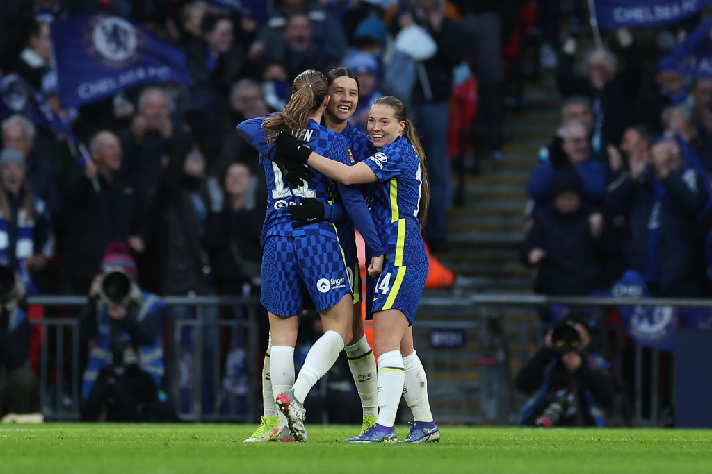 Sam Kerr celebrates with teammates Fran Kirby and Guro Reiten of Chelsea after scoring their team's second goal during the Vitality Women's FA Cup Final between Arsenal FC and Chelsea FC at Wembley Stadium on December 05, 2021 in London, England. (Photo by Richard Heathcote/Getty Images)