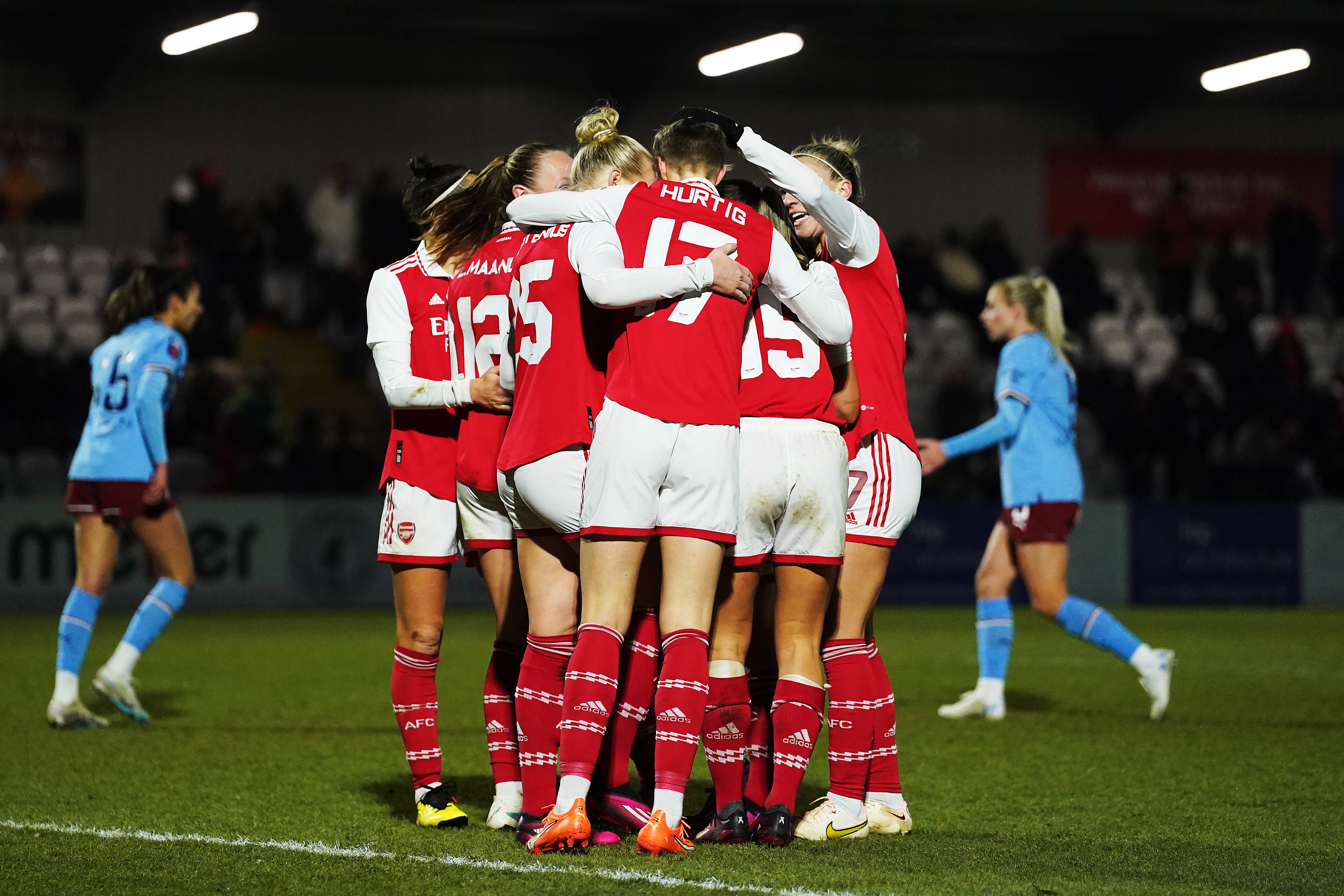 The Arsenal players celebrate their goal during the FA Women's Continental Tyres League Cup Semi Final match between Arsenal and Manchester City at Meadow Park on February 08, 2023 in Borehamwood, England.