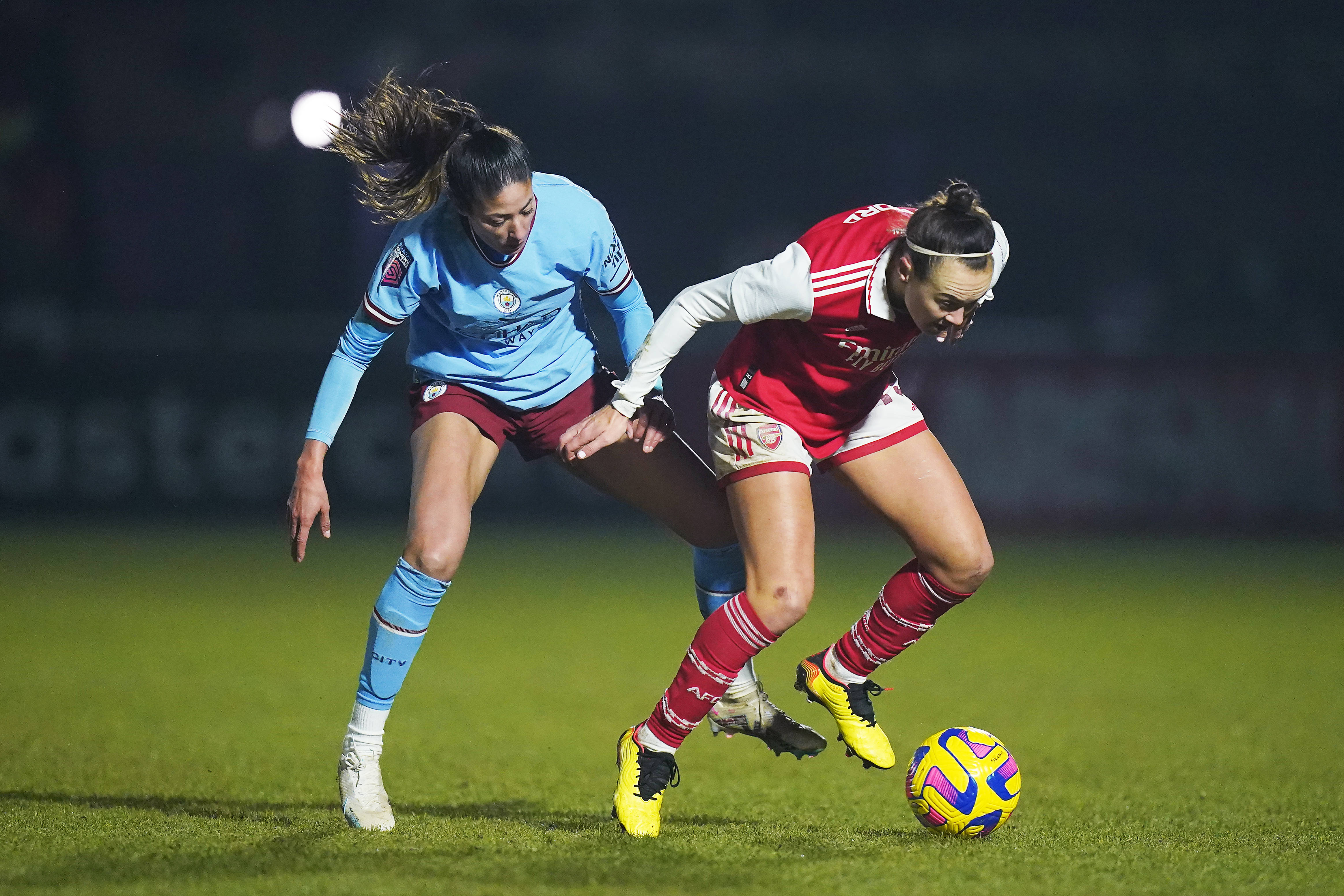 Leila Ouahabi of Manchester City battles for possession with Caitlin Foord of Arsenal during the FA Women's Continental Tyres League Cup Semi Final match between Arsenal and Manchester City at Meadow Park on February 08, 2023 in Borehamwood, England.