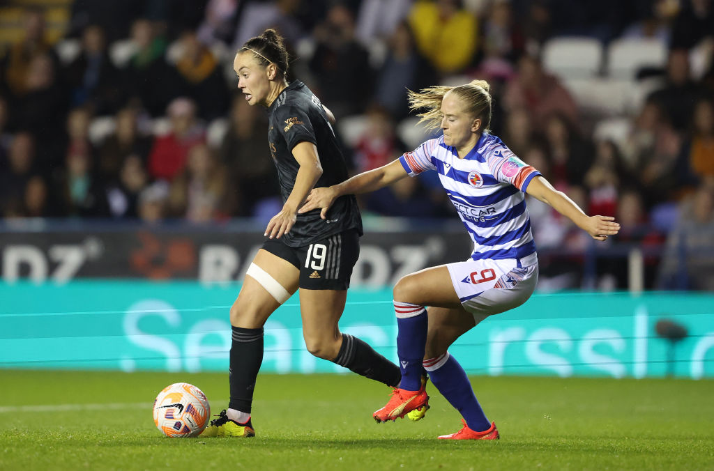 Caitlin Foord of Arsenal battles for possession with Amalie Eikeland of Reading during the FA Women's Super League match between Reading and Arsenal at Madejski Stadium on October 16, 2022 in Reading, England. (Photo by Warren Little/Getty Images)