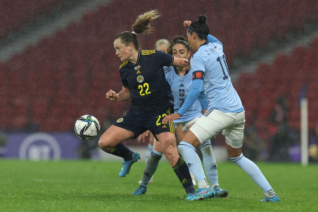 Erin Cuthbert of Scotland is challenged by Jennifer Hermoso and Olga Carmona of Spain (obscured) during the FIFA Women's World Cup 2023 Qualifier group B match between Scotland and Spain at Hamp