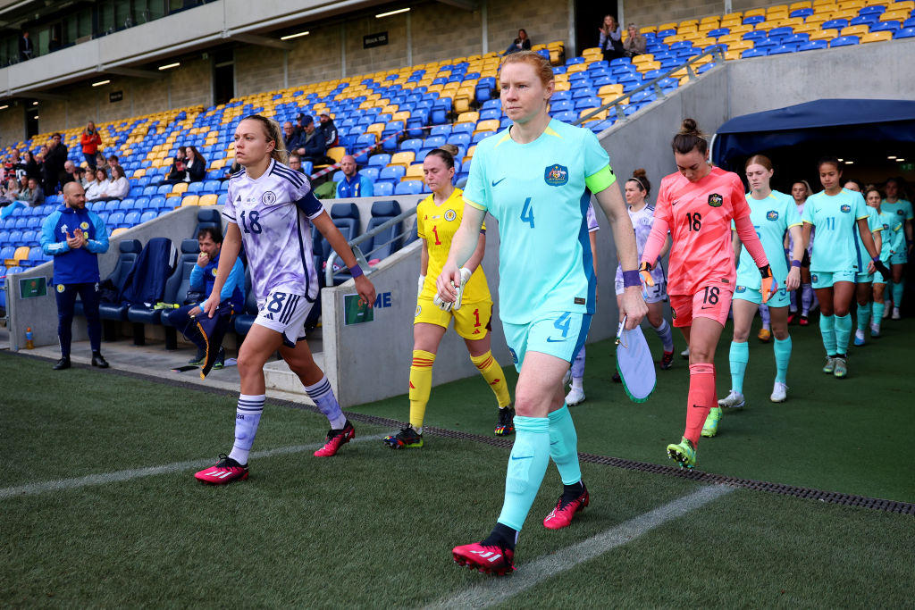 Claire Emslie of Scotland and Clare Polinghome of Australia lead their side' out prior to the Women's International Friendly match between Australia and Scotland at The Cherry Red Records Stadium on April 07, 2023 in Wimbledon, England. (Photo by Tom Dula Claire Emslie of Scotland and Clare Polinghome of Australia lead their side' out prior to the Women's International Friendly match between Australia and Scotland at The Cherry Red Records Stadium on April 07, 2023 in Wimbledon, England. (Photo by Tom Dulat/Getty Images)