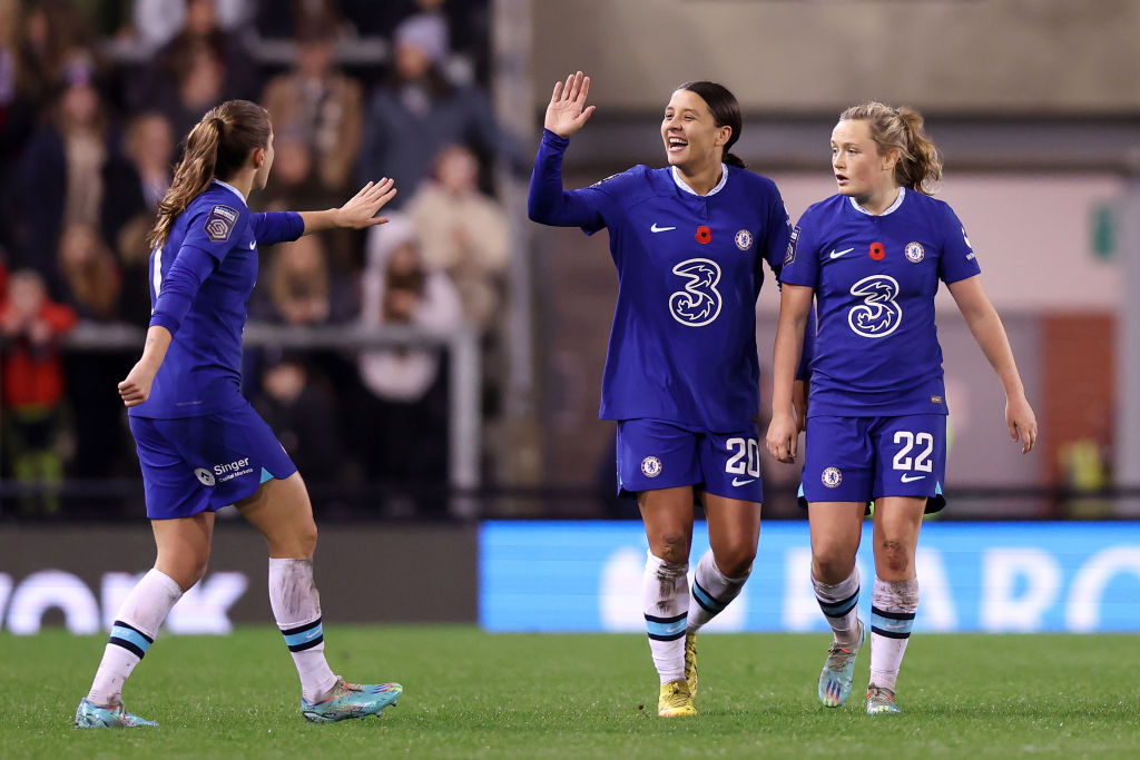 Sam Kerr of Chelsea celebrates with Erin Cuthbert and Guro Reiten after scoring their team's first goal during the FA Women's Super League match between Manchester United and Chelsea at Leigh Sports Village on November 06, 2022 in Leigh, England. (Photo by Nathan Stirk/Getty Images)