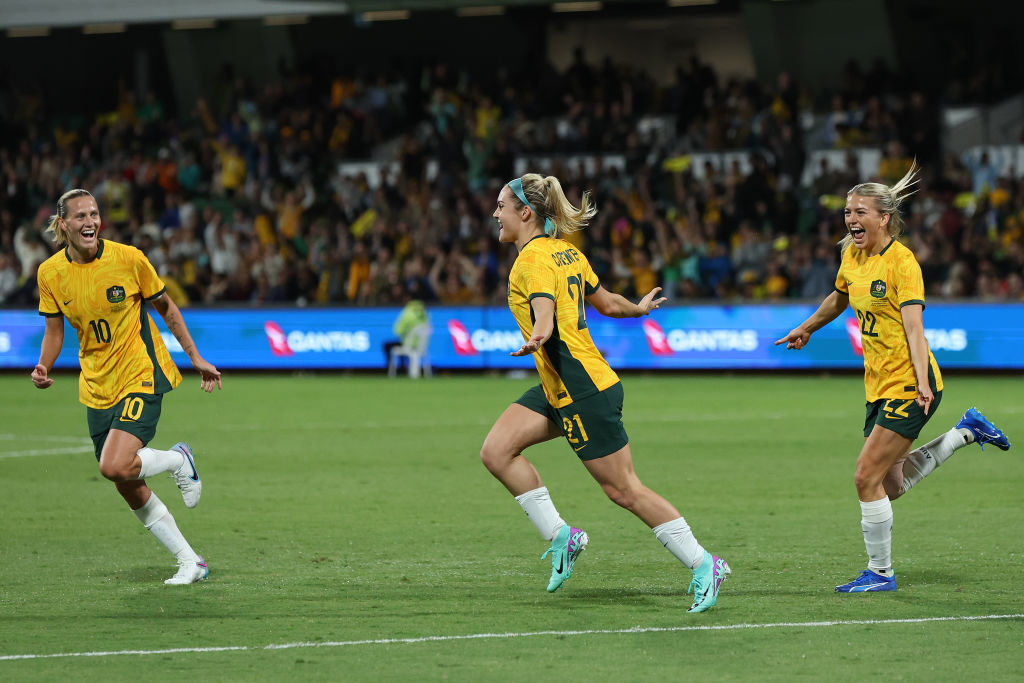 Ellie Carpenter of the Matildas celebrates after scoring a goal during the AFC Women's Asian Olympic Qualifier match between Australia Matildas and IR Iran at HBF Park on October 26, 2023 in Perth, Australia. (Photo by Will Russell/Getty Images)