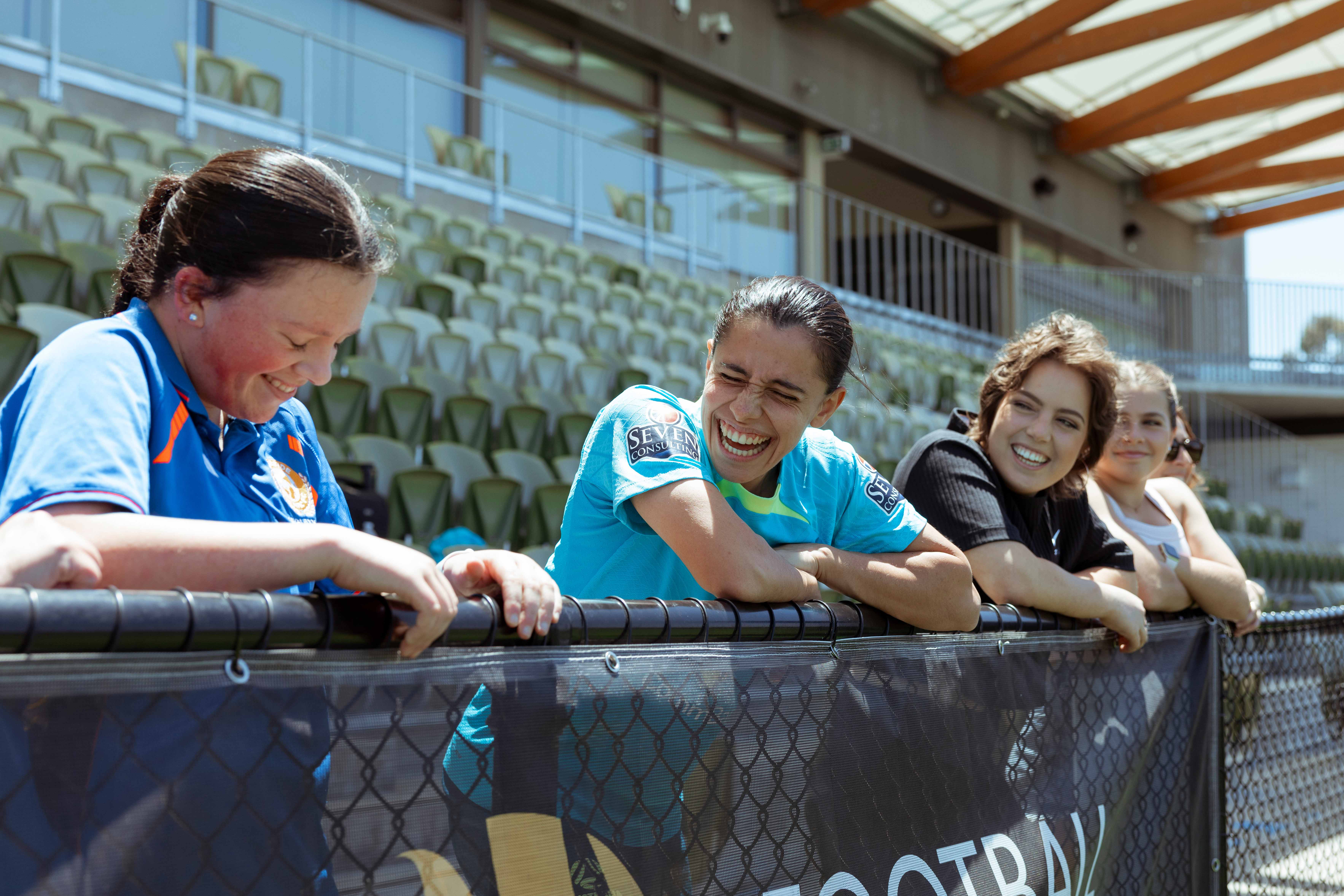 Katie (L) and Ella (R) talk with Alex Chidiac at CommBank Matildas' training in Perth. (Photo: Tiffany Williams/Football Australia)