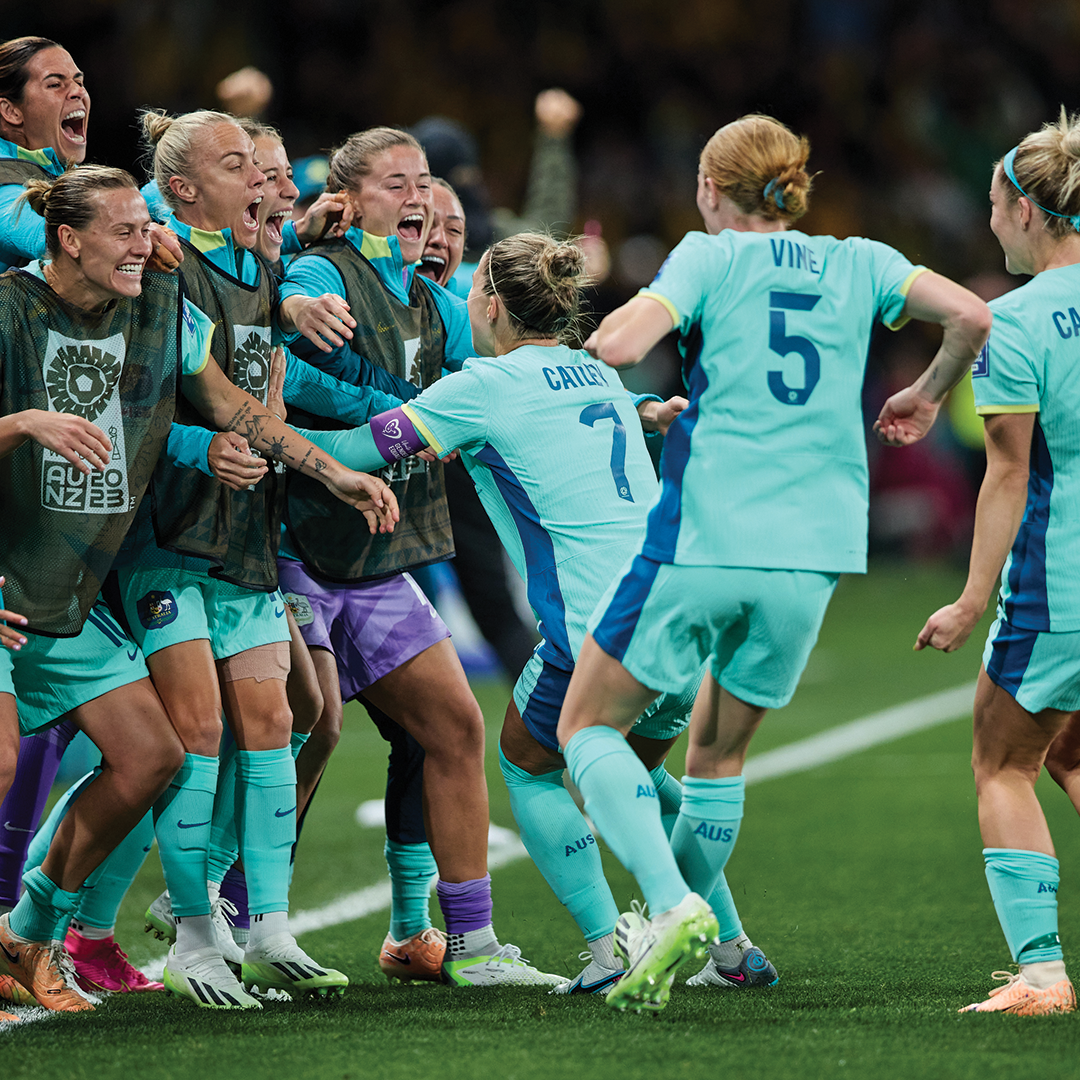 Steph Catley celebrates her goal against Canada