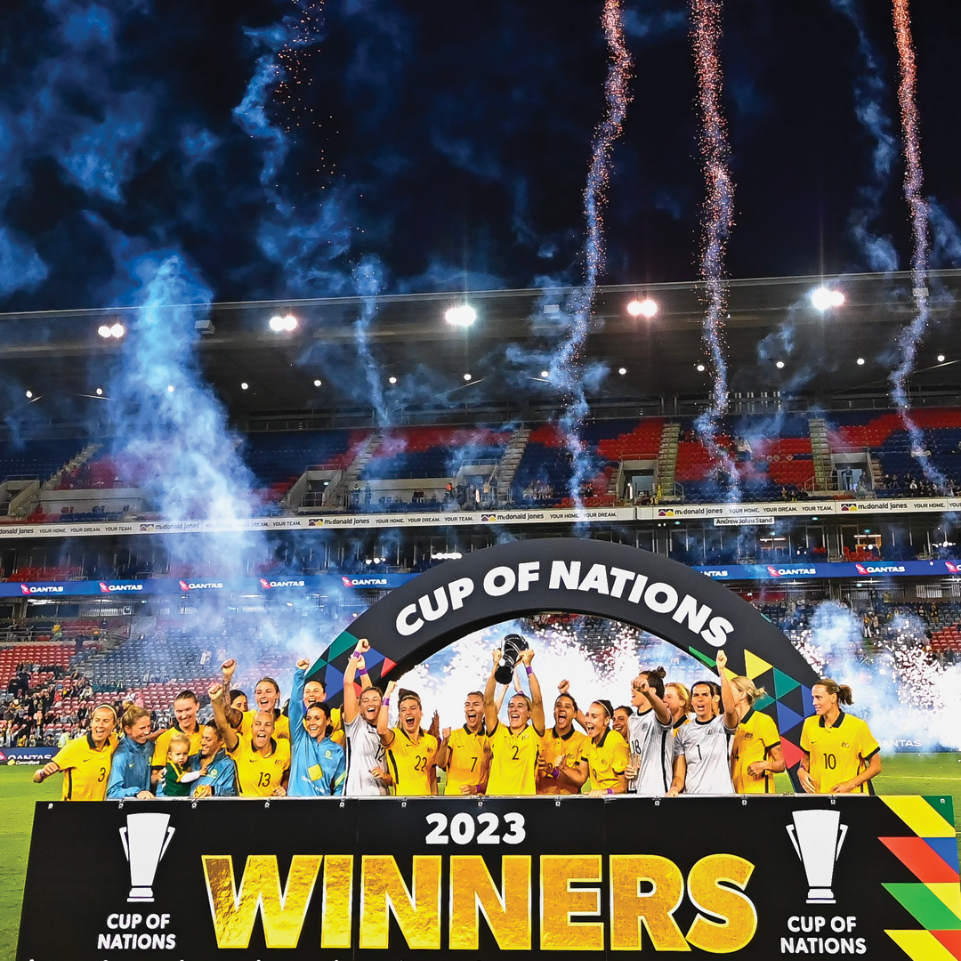 Lifting the Cup of Nations trophy