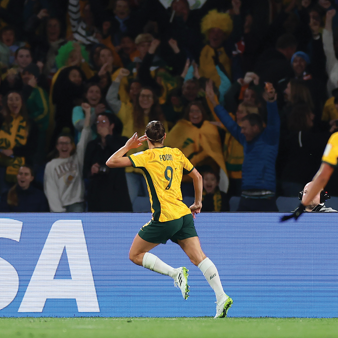 Caitlin Foord celebrates her goal against Denmark.