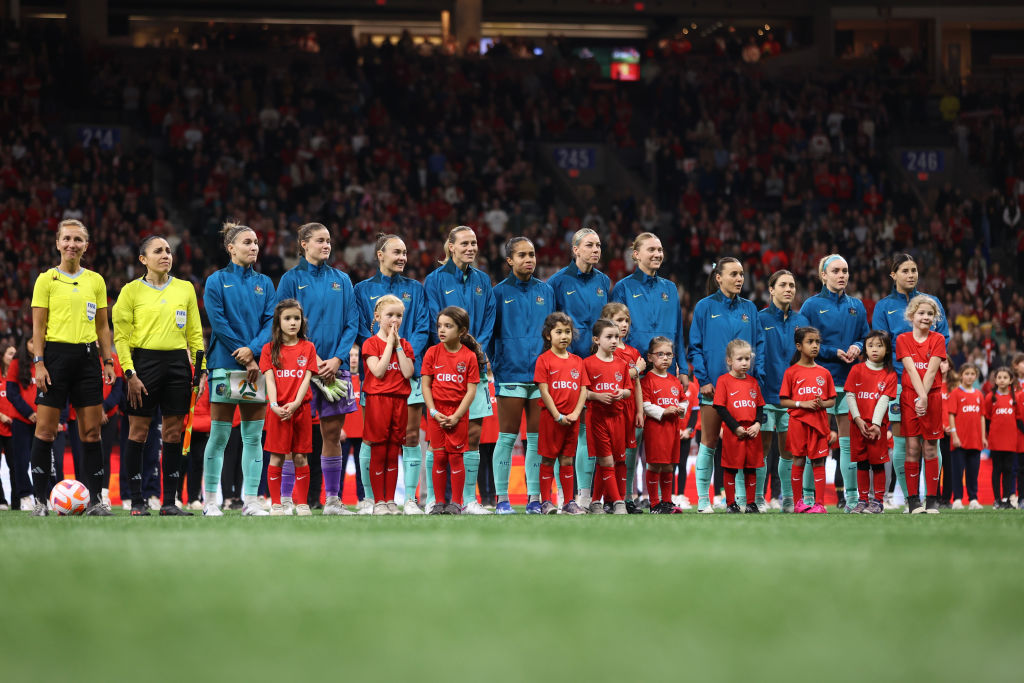  Australian players during a ceremony before the match against Canada at BC Place on December 05, 2023 in Vancouver, British Columbia. (Photo by Craig Mitchelldyer/Getty Images for Football Australia)