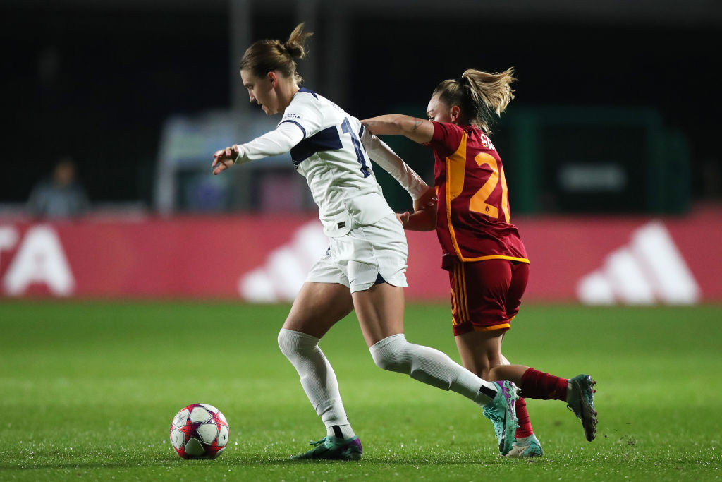Clare Hunt of Paris Saint-Germain is challenged by Giada Greggi of AS Roma during the UEFA Women's Champions League group stage match between AS Roma and Paris Saint-Germain at Stadio Tre Fontane on December 20, 2023 in Rome, Italy. (Photo by Paolo Bruno/Getty Images)