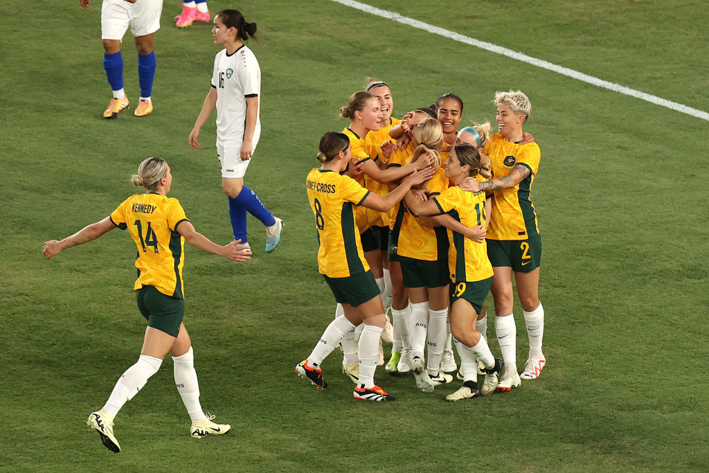 MELBOURNE, AUSTRALIA - FEBRUARY 28: Matildas celebrate the 1st goal of the match during the AFC Women's Olympic Football Tournament Paris 2024 Asian Qualifier Round 3 match between Australia Matildas and Uzbekistan at Marvel Stadium on February 28, 2024 in Melbourne, Australia. (Photo by Kelly Defina/Getty Images)