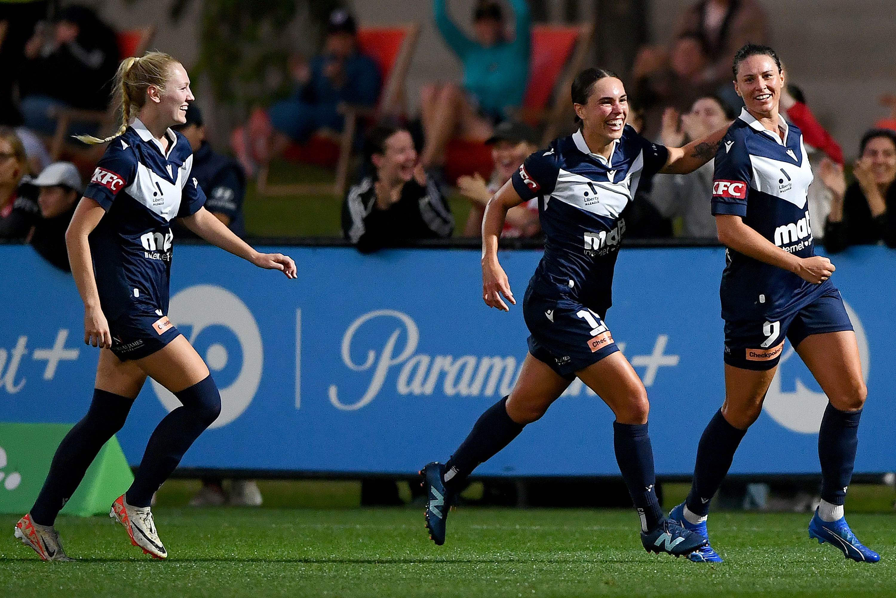  Emily Gielnik of Melbourne Victory is congratulated by team mates after scoring a goal during the A-League Women round 17 match between Melbourne Victory and Western Sydney Wanderers at La Trobe University Sports Fields, on February 16, 2024, in Melbourne, Australia. (Photo by Josh Chadwick/Getty Images)