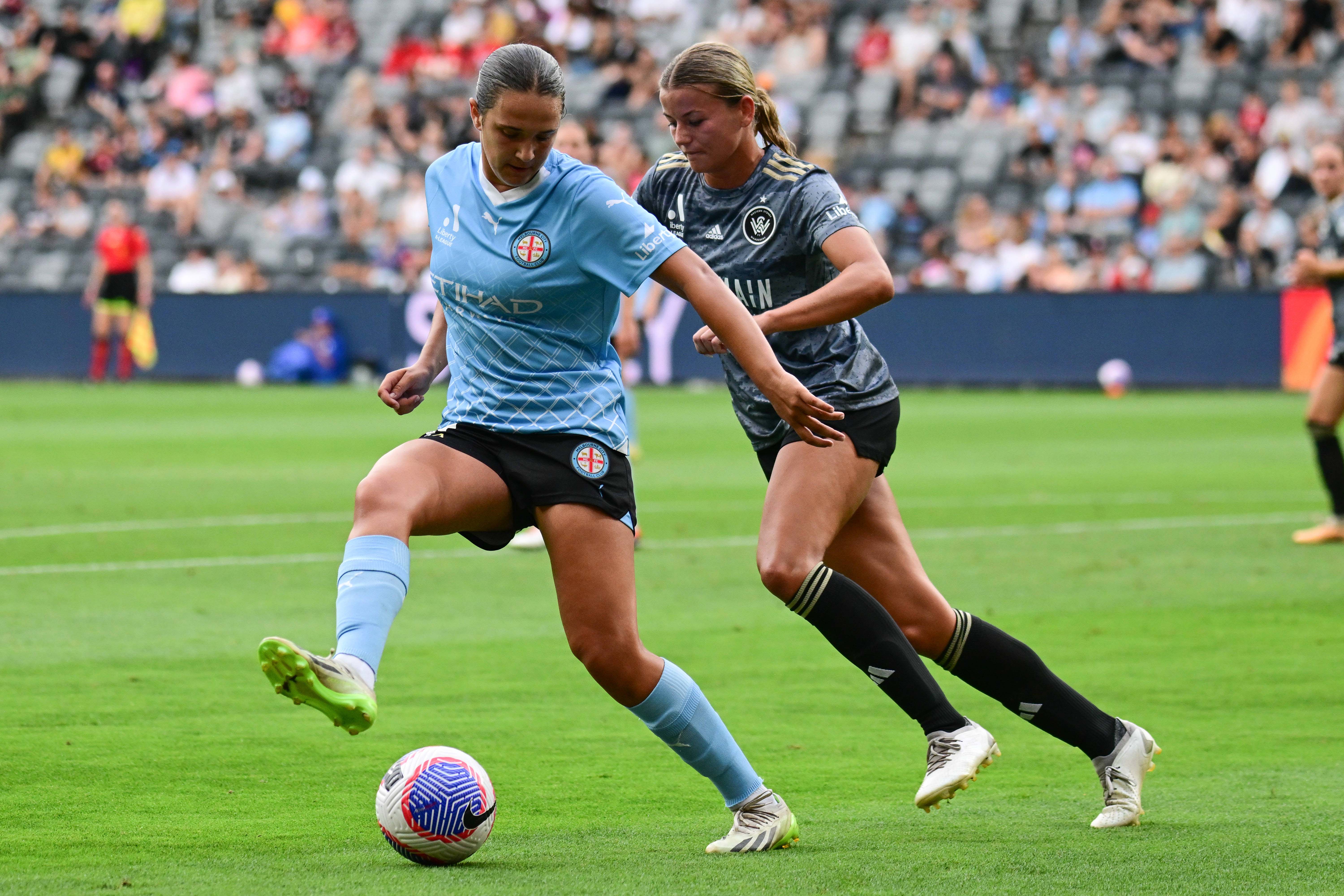Daniela Galic (L) of the Melbourne City FC and Sophie Harding (R) of the Western Sydney Wanderers FC seen in action during the 2023–24 A-League Women season Unite Round match between Western Sydney Wanderers FC and Melbourne City FC at CommBank Stadium.