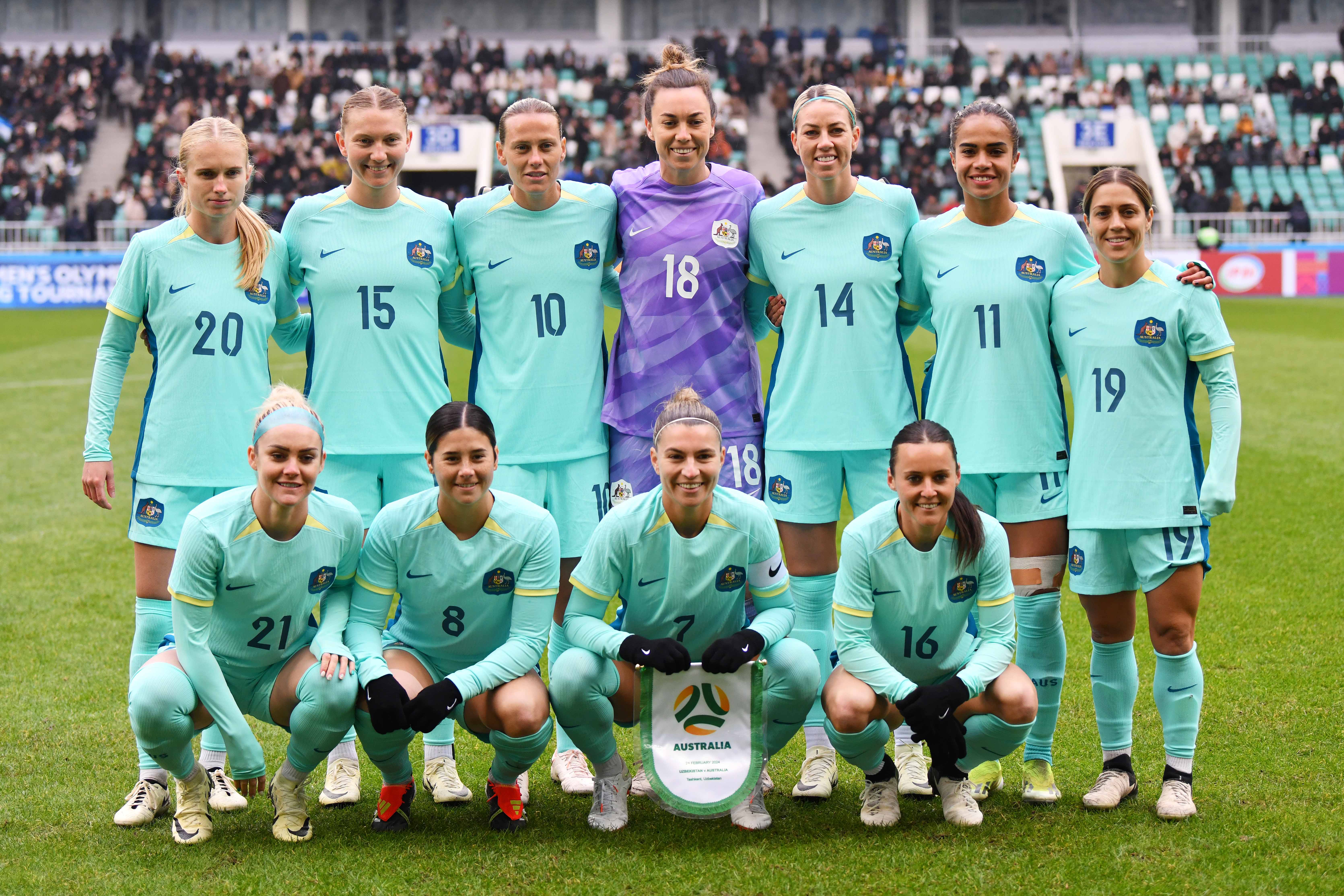 Australia players pose for a team photograph prior to the AFC Women's Paris 2024 Olympic Qualifier Round 3 match between Uzbekistan and Australia Matildas at Milliy Stadium on February 24, 2024 in Tashkent, Uzbekistan. (Photo by Tolib Kosimov/Getty Images)