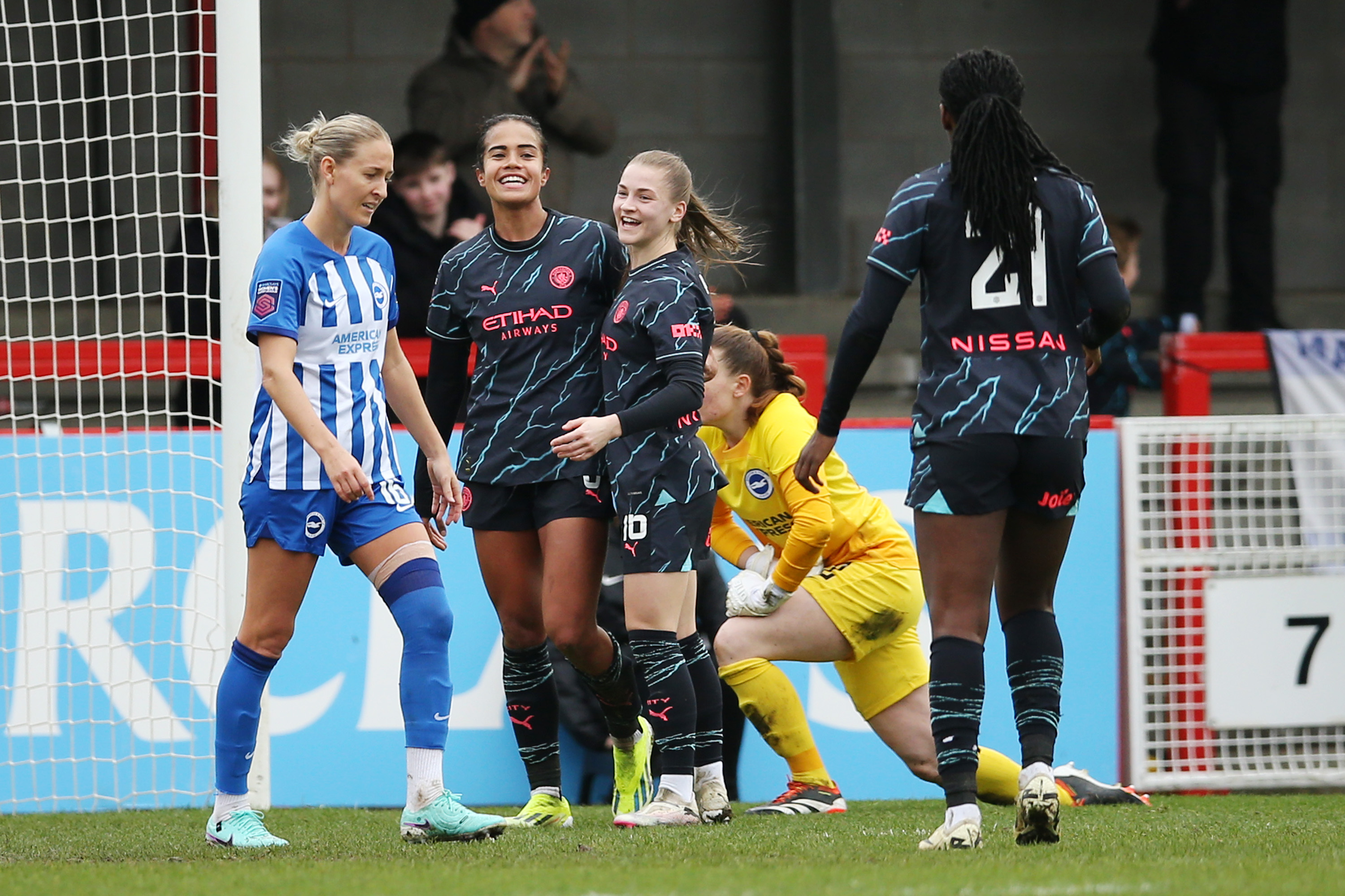 Mary Fowler of Manchester City celebrates scoring her team's second goal with teammate Jess Park during the Barclays Women´s Super League match between Brighton & Hove Albion and Manchester City at Broadfield Stadium on March 17, 2024 in Crawley, England. (Photo by Steve Bardens/Getty Images)