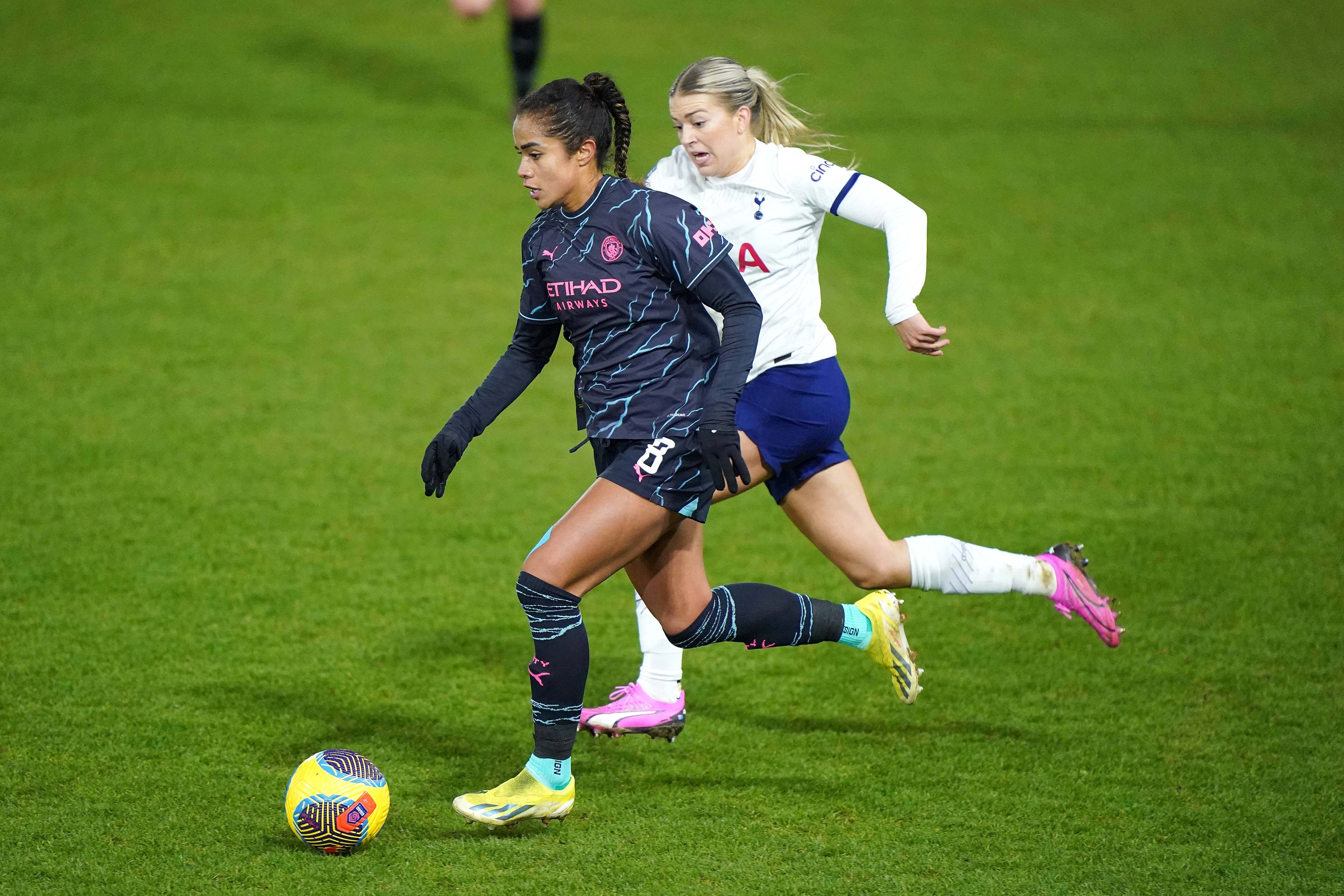 Manchester City s Mary Fowler (left) goes past Tottenham Hotspur s Charlotte Grant during the FA Women s Continental Tyres League Cup quarter final match at Brisbane Road, London.