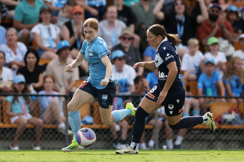 SYDNEY, AUSTRALIA - MARCH 31: Cortnee Vine of Sydney FC is challenged by Alana Murphy of the Victory during the A-League Women round 22 match between Sydney FC and Melbourne Victory at Leichhardt Oval, on March 31, 2024, in Sydney, Australia. (Photo by Matt King/Getty Images)