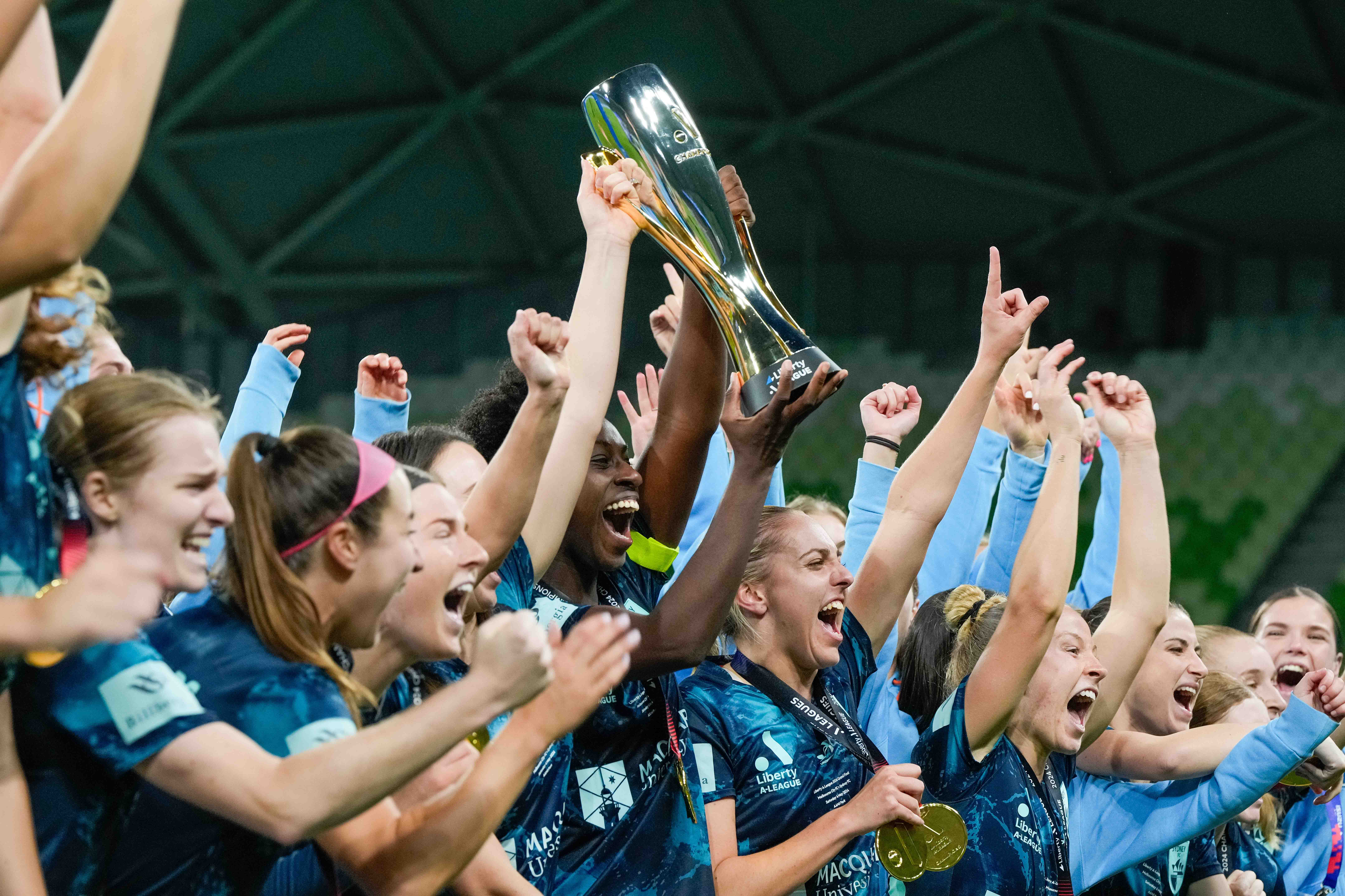 Princess Megan Ategbayon Ibini-Isei and Sydney FC players celebrate during the trophy presentation during the A-League Women Grand Final match between Melbourne City and Sydney FC at AAMI Park, on May 04, 2024, in Melbourne, Australia. (Photo by Asanka Ratnayake/Getty Images for A-Leagues)