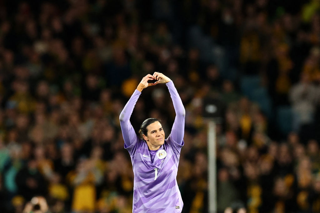Australia's goalkeeper Lydia Williams thanks to the crowd as she walks of the field during the first half of play of a friendly football match between Australia and China at Accor Stadium in Sydney on June 03, 2024. (Photo by DAVID GRAY / AFP) / -- IMAGE RESTRICTED TO EDITORIAL USE - STRICTLY NO COMMERCIAL USE -- (Photo by DAVID GRAY/AFP via Getty Images)