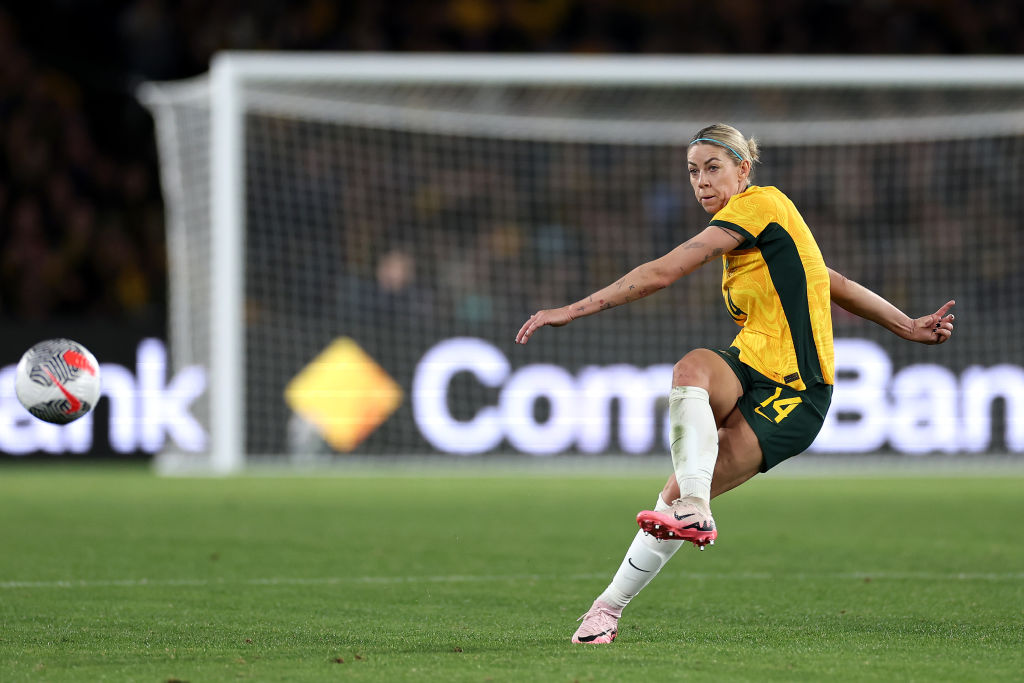 SYDNEY, AUSTRALIA - JUNE 03: Alanna Kennedy of Australia kicks the ball during the international friendly match between Australia Matildas and China PR at Accor Stadium on June 03, 2024 in Sydney, Australia. (Photo by Cameron Spencer/Getty Images)