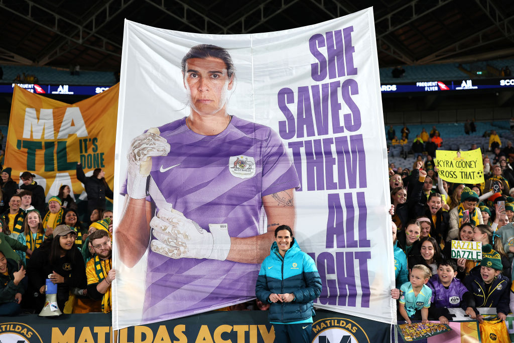 SYDNEY, AUSTRALIA - JUNE 03: Lydia Williams, goalkeeper of Australia poses in-front of a banner after during the international friendly match between Australia Matildas and China PR at Accor Stadium on June 03, 2024 in Sydney, Australia. (Photo by Cameron Spencer/Getty Images)