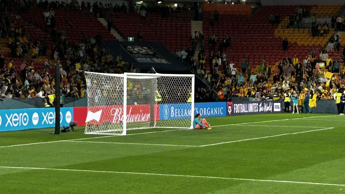 Lydia Williams sitting on the pitch after Australia loses to Sweden in the FIFA 2023 Women's World Cup third-place play-off - Sophie Armour