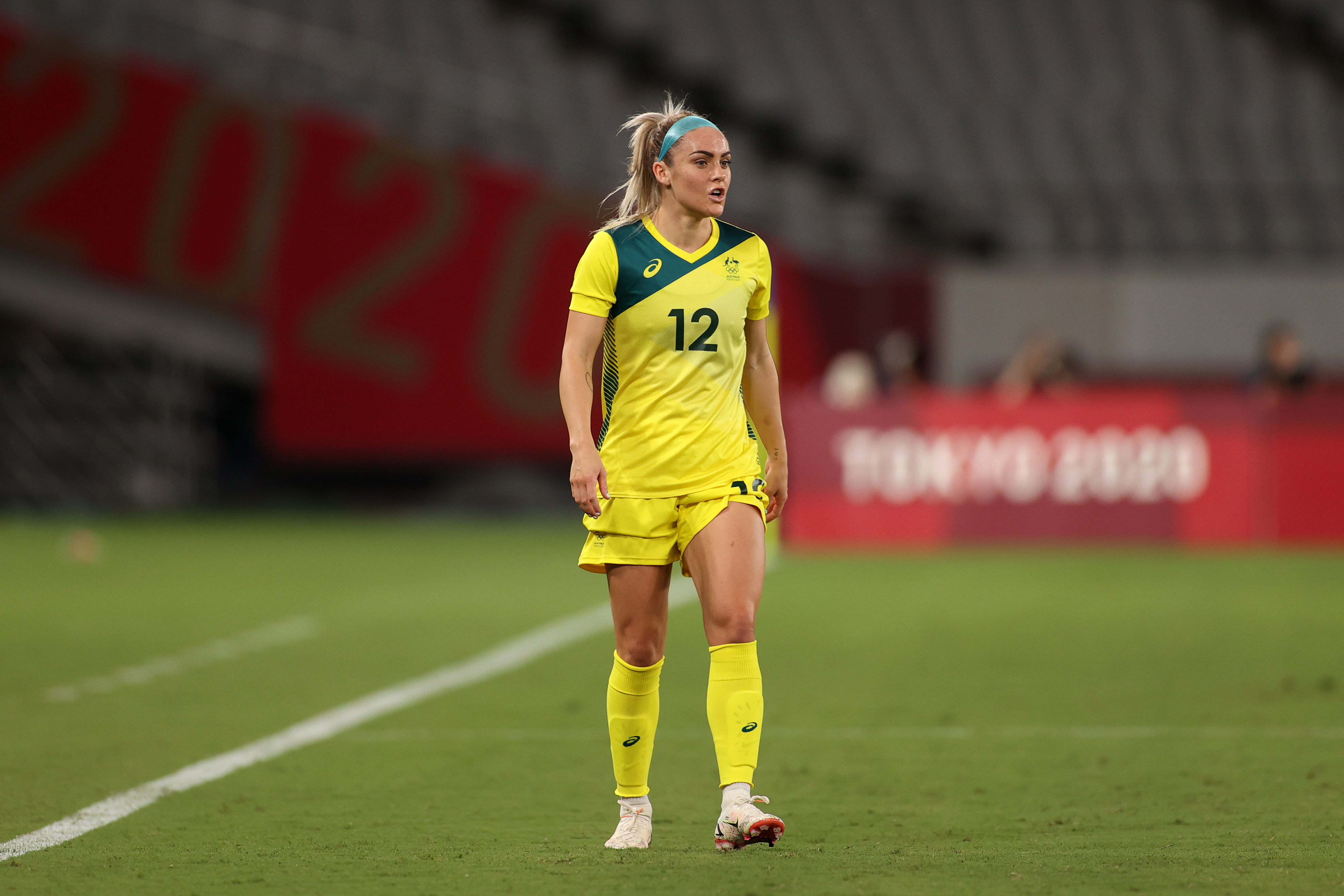 Ellie Carpenter #12 of Team Australia looks on during the Women's First Round Group G match between Australia and New Zealand during the Tokyo 2020 Olympic Games at Tokyo Stadium on July 21, 2021 in Chofu, Tokyo, Japan. (Photo by Dan Mullan/Getty Images)