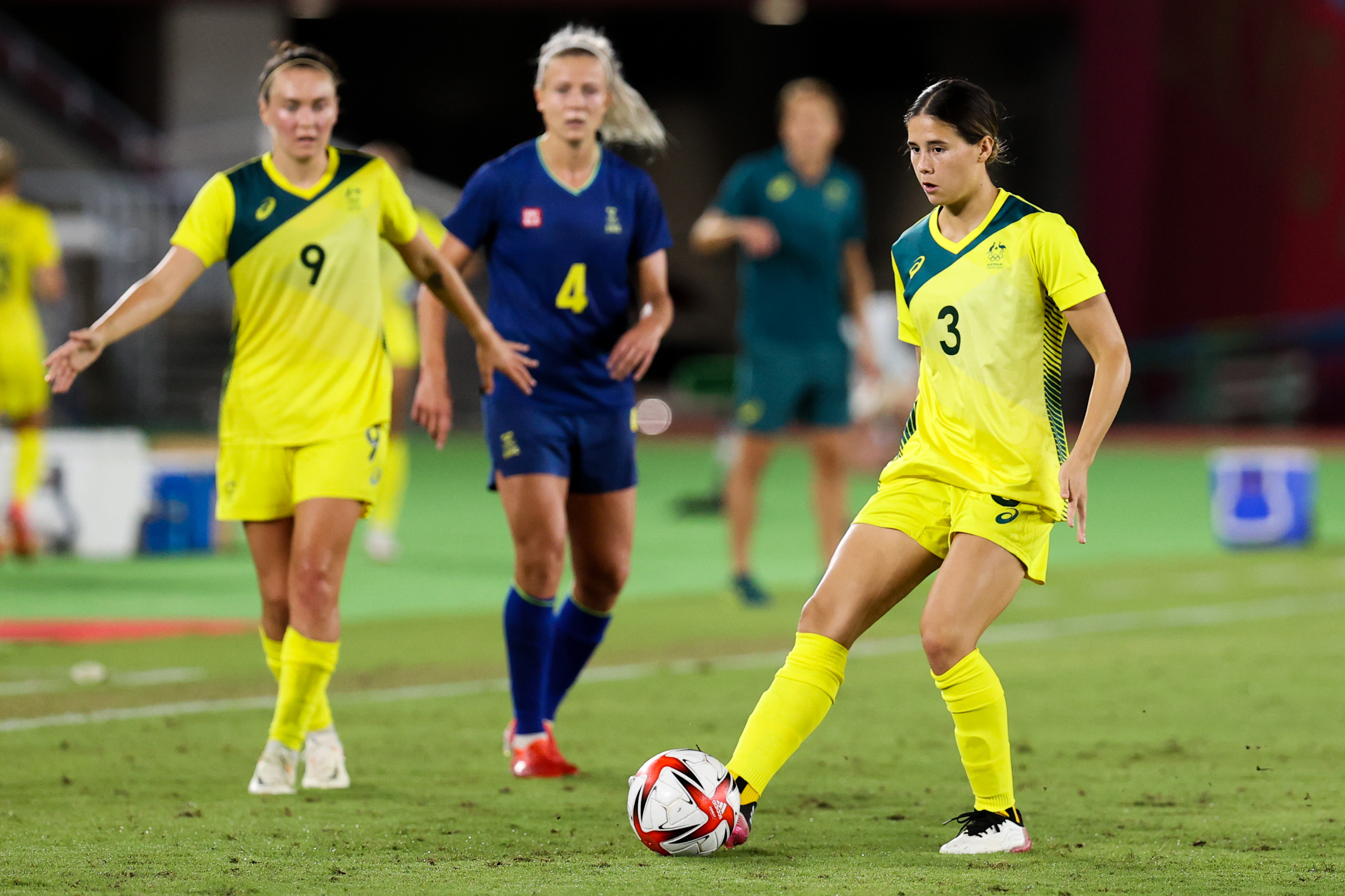 Kyra Cooney-Cross #3 of Team Australia pass the ball during the match between Australia and Sweden on day ten of the Tokyo 2020 Olympic Games at International Stadium Yokohama on August 02, 2021 in Yokohama, Kanagawa, Japan. (Photo by Zhizhao Wu/Getty Images)