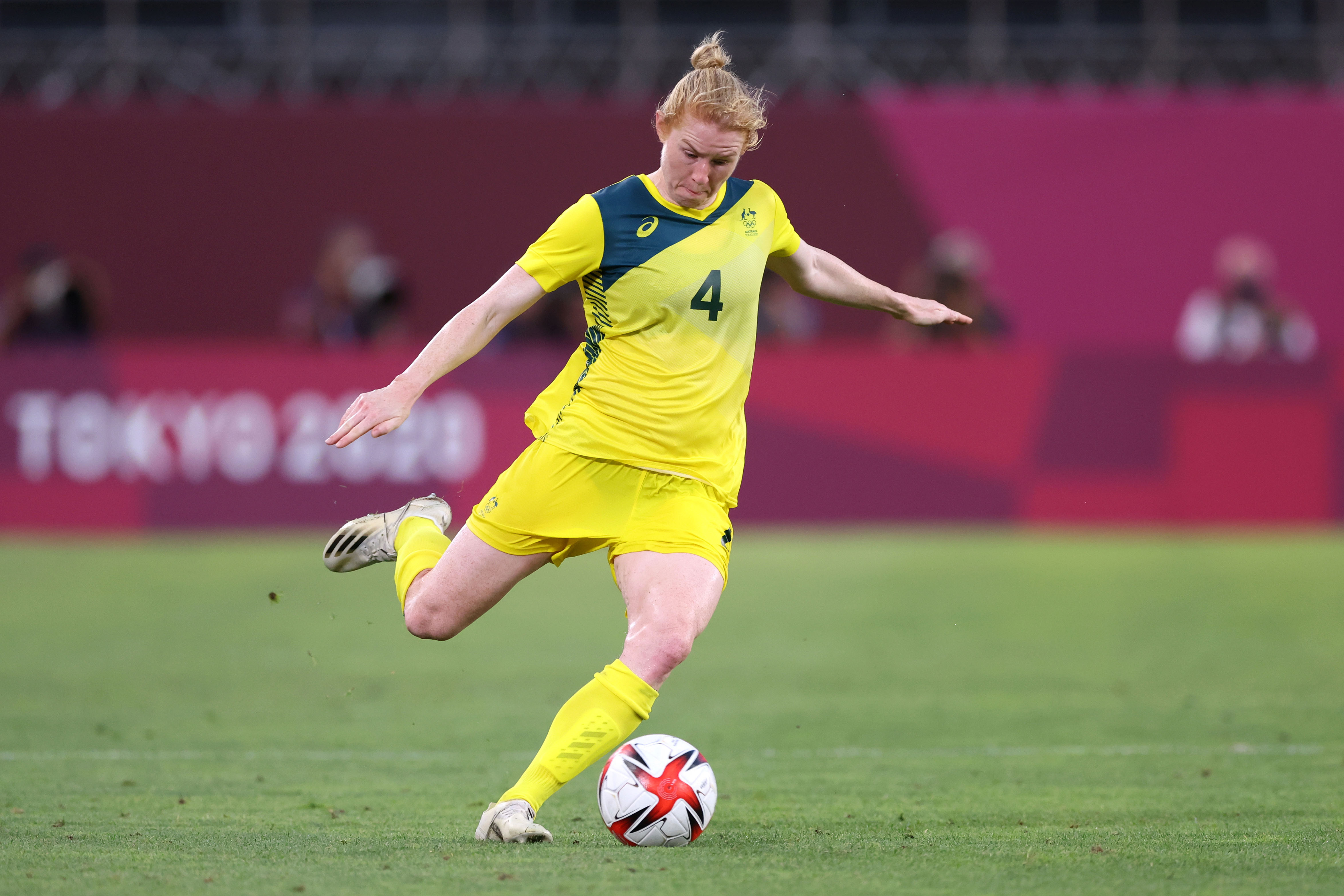 Clare Polkinghorne #4 of Team Australia makes a pass during the Women's Bronze Medal match between United States and Australia on day thirteen of the Tokyo 2020 Olympic Games at Kashima Stadium on August 05, 2021 in Kashima, Japan. (Photo by Elsa/Getty Images)