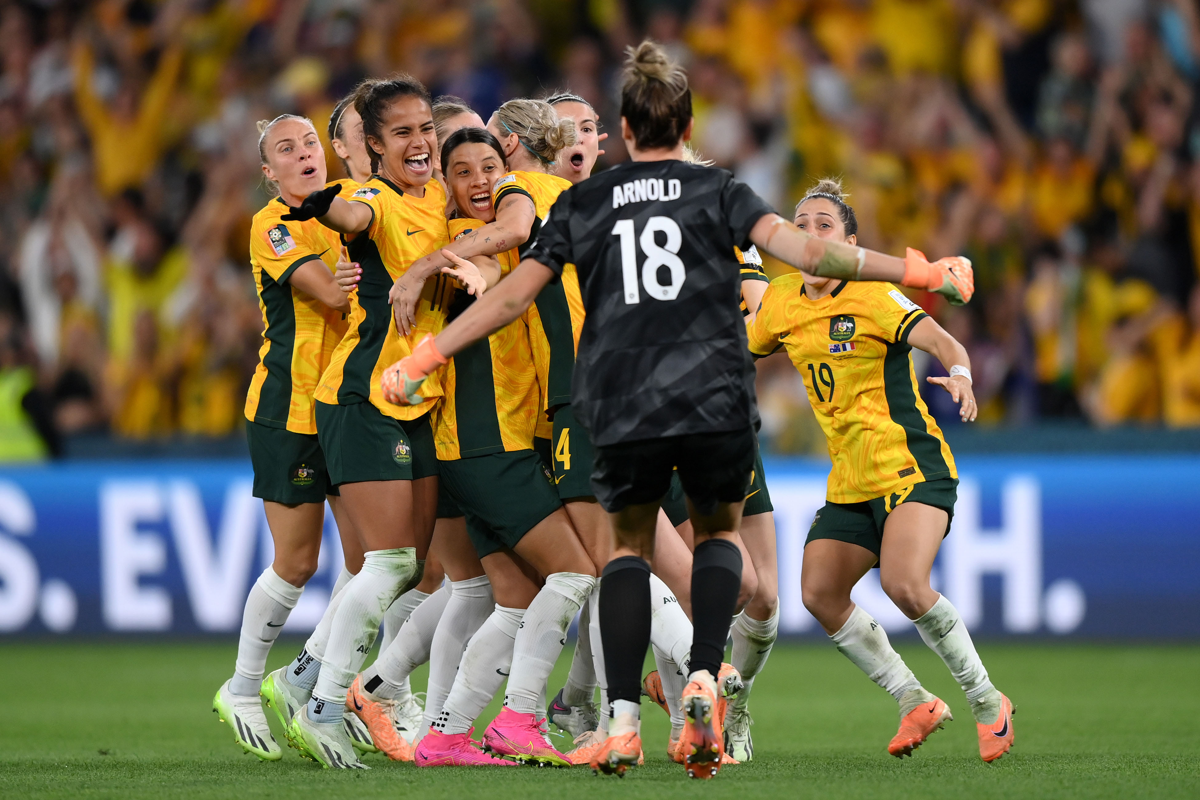 Players of Australia celebrate their side's victory in the penalty shoot out after Cortnee Vine of Australia scores her team's tenth penalty in the penalty shoot out during the FIFA Women's World Cup Australia & New Zealand 2023 Quarter Final match between Australia and France at Brisbane Stadium on August 12, 2023 in Brisbane, Australia. (Photo by Justin Setterfield/Getty Images)
