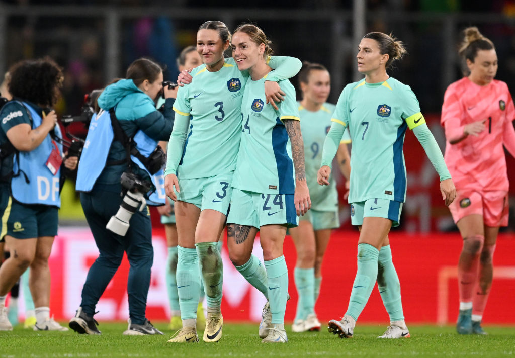 DUISBURG, GERMANY - OCTOBER 28: Winonah Heatley and Sharn Freier of Australia celebrate following the team's victory in the Women's international friendly match between Germany and Australia at Schauinsland-Reisen-Arena on October 28, 2024 in Duisburg, Germany. (Photo by Frederic Scheidemann/Getty Images for Football Australia)