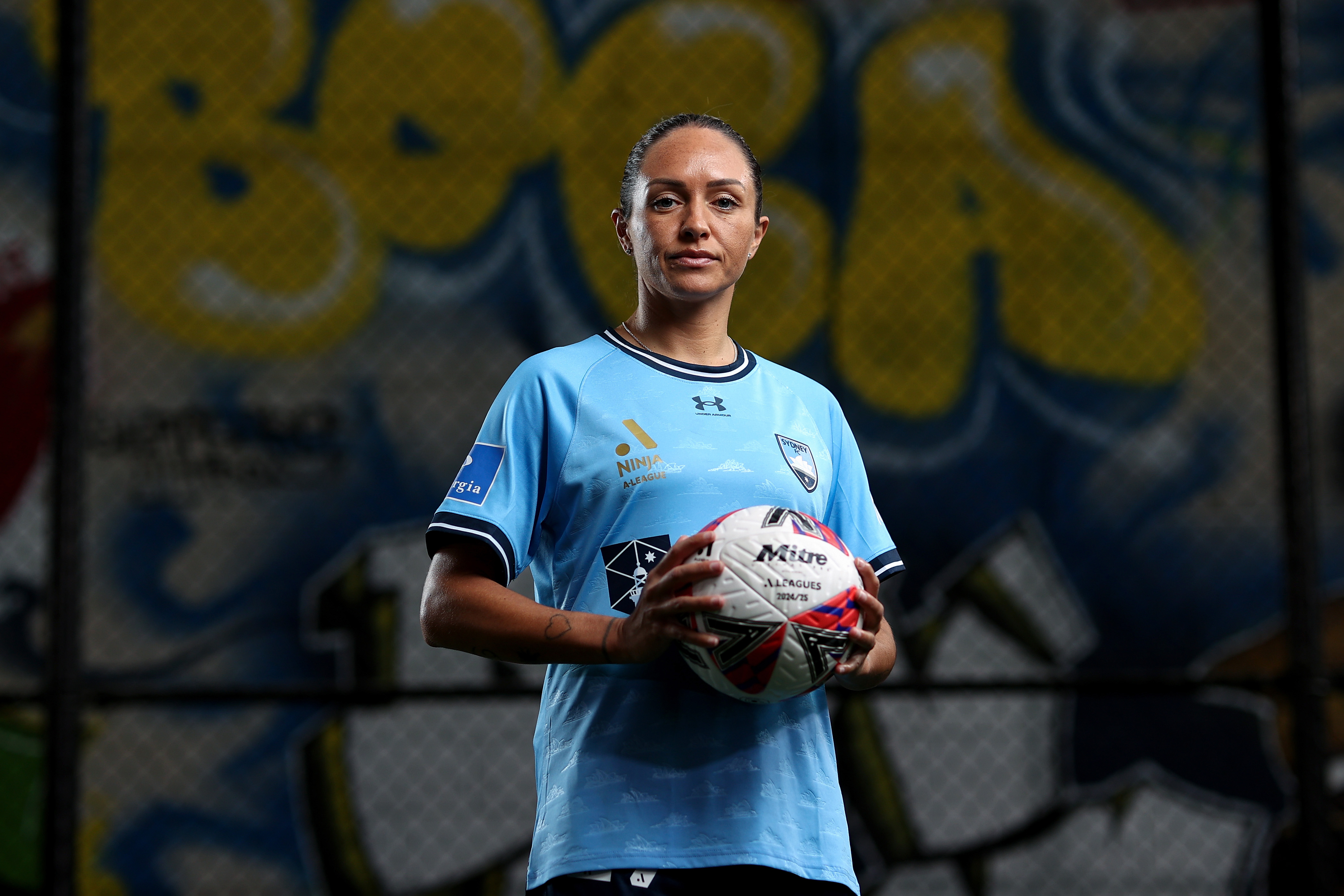 Kyah Simon of Sydney FC poses for a portrait during the Sydney A-League men's season launch at Ultra Football on October 09, 2024 in Sydney, Australia. (Photo by Brendon Thorne/Getty Images for A-Leagues)