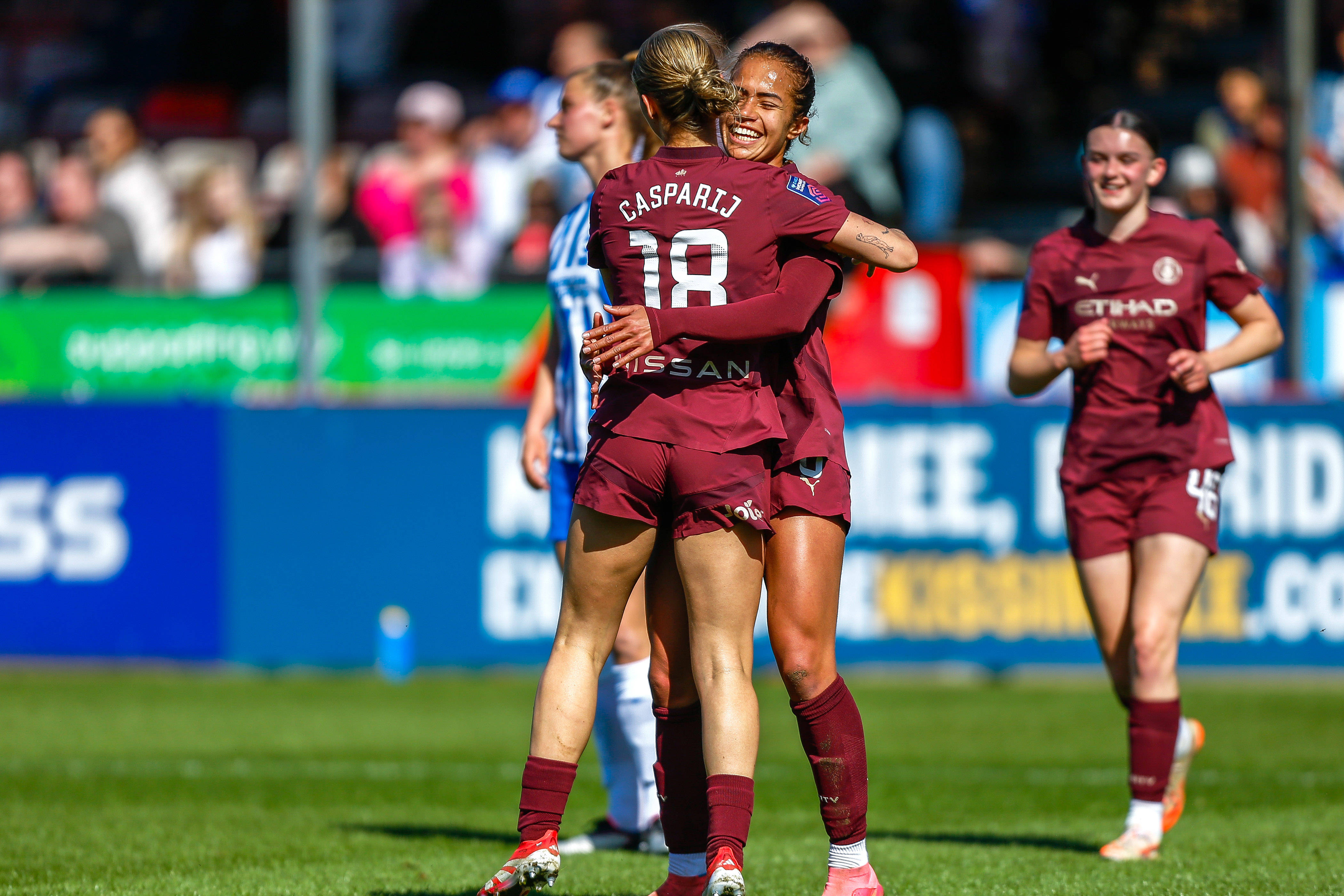 Kerstin Casparij (18 Manchester City) congratulates Mary Fowler (8 Manchester City) for assiting her goal during the Barclay s Women s Super League game between Brighton Women and Man City Women, at Broadfields Stadium in West Sussex, England. (Neil Holmes SPP)