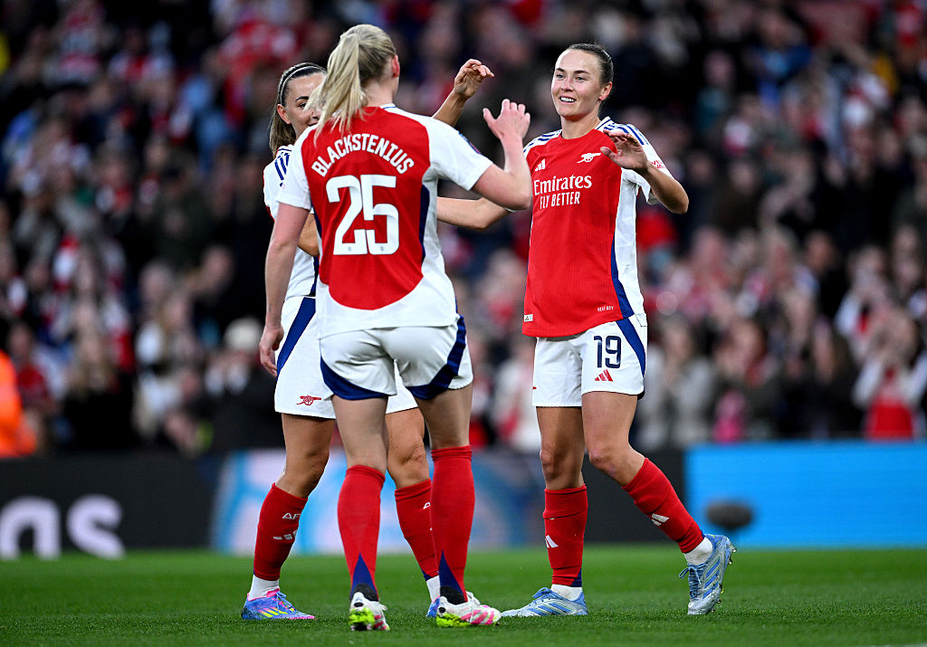 Caitlin Foord of Arsenal celebrates scoring her team's first goal with teammates Katie McCabe and Stina Blackstenius during the Barclays Women's Super League match between Arsenal FC and Leicester City FC at Emirates Stadium on April 15, 2025 in London, England. (Photo by Justin Setterfield/Getty Images)