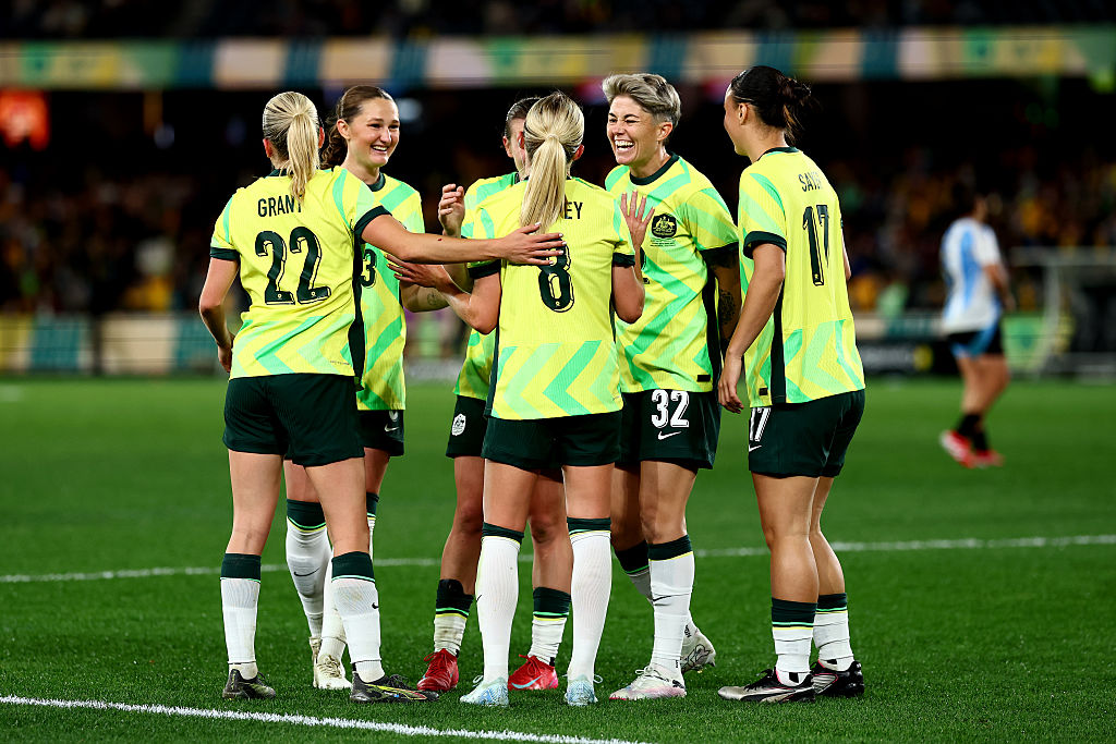 Kaitlyn Torpey of Australia celebrates with team mates after kicking a goal during the International Friendly match between Australia Matildas and Argentina at Marvel Stadium on May 30, 2025 in Melbourne, Australia. (Photo by Morgan Hancock/Getty Images)