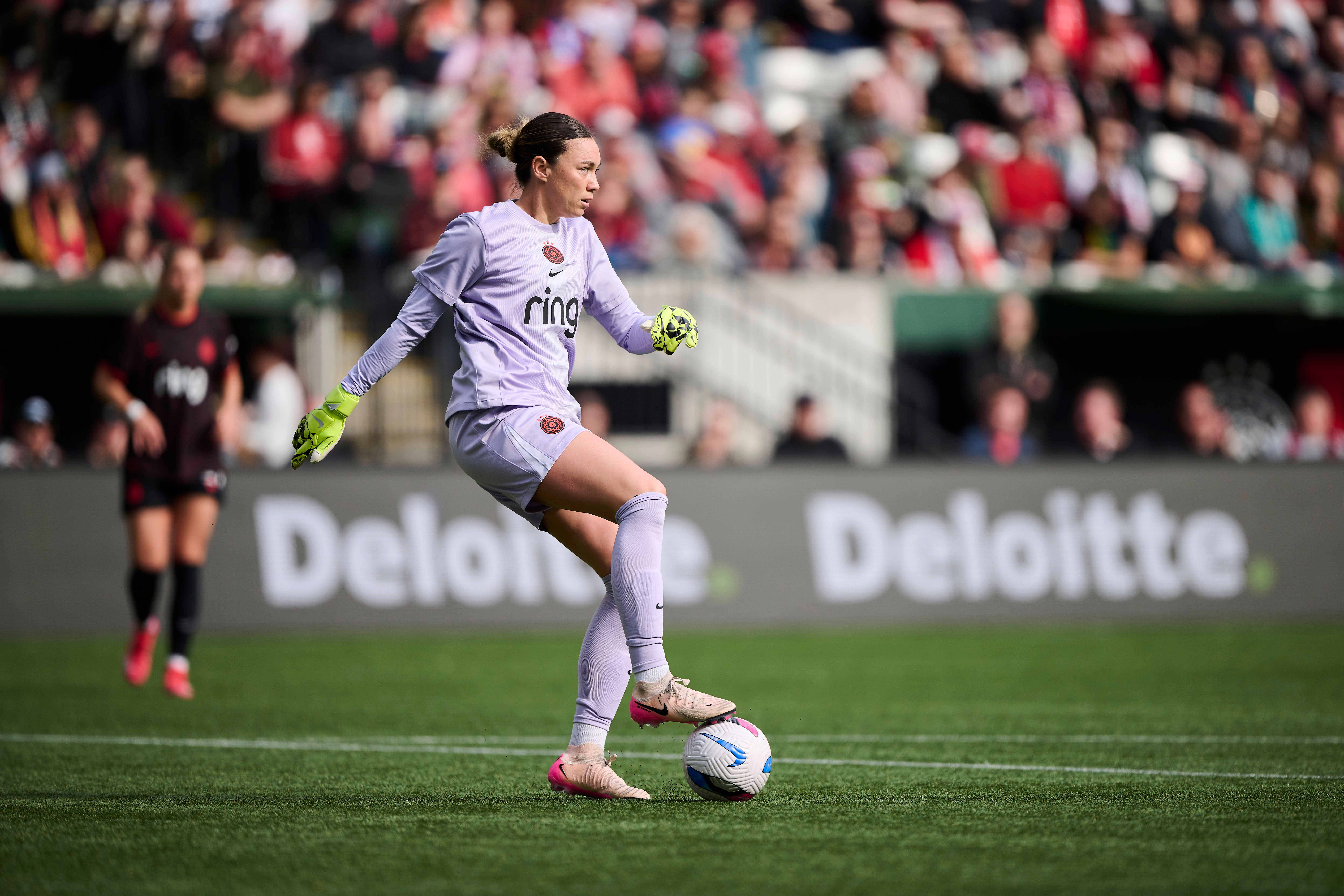 Portland Thorns FC goalkeeper Mackenzie Arnold (18) prepares to kick the ball during the first half against Orlando Pride at Providence Park.