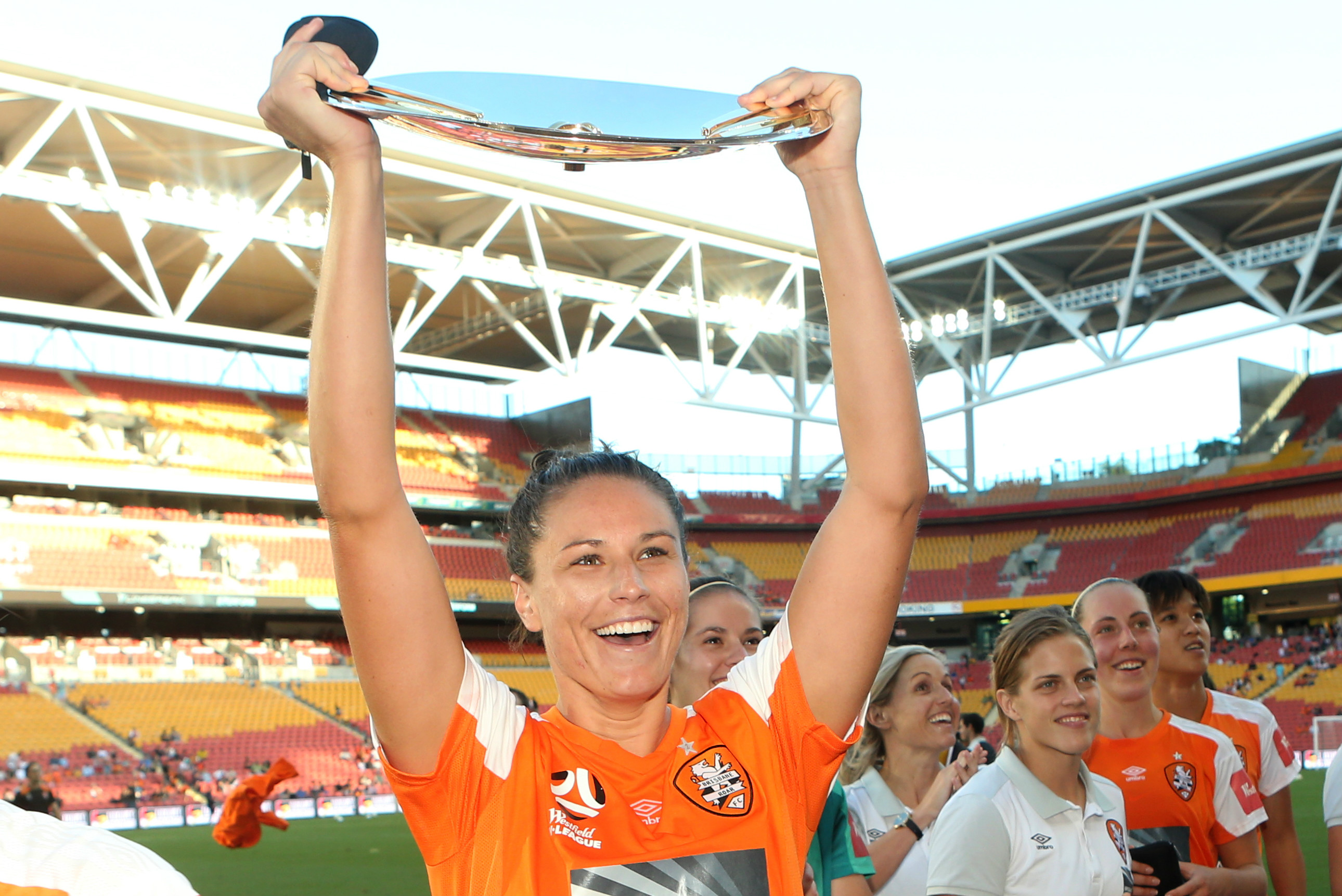 Emily Gielnik lifts the Premiers' Plate on Sunday.