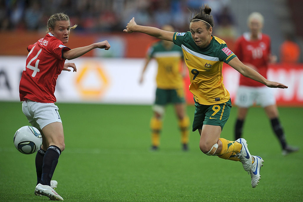 LEVERKUSEN, GERMANY - JULY 06: Caitlin Foord of Australia flicks the ball past Gry Tofte Ims of Norway during the FIFA Women's World Cup 2011 Group D match between Australia and Norway at the FIFA World Cup Stadium Leverkusen on July 6, 2011 in Leverkusen, Germany. (Photo by Christopher Lee/Getty Images)