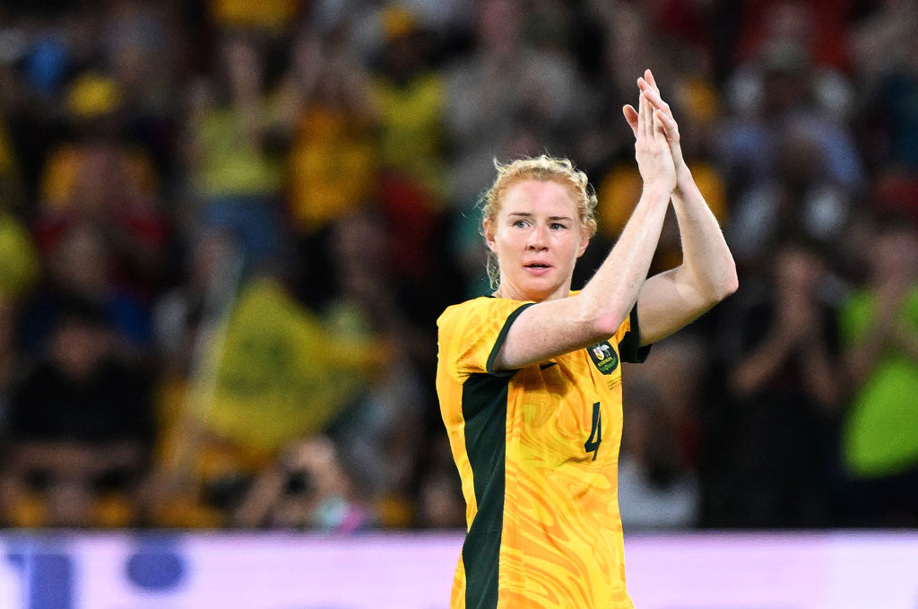 BRISBANE, AUSTRALIA - NOVEMBER 28: Clare Polkinghorne of Australia applauds the fans as she is subbed off during her final appearance for Australia in the International Friendly match between the Matildas and Brazil at Suncorp Stadium on November 28, 2024 in Brisbane, Australia. (Photo by Bradley Kanaris/Getty Images)