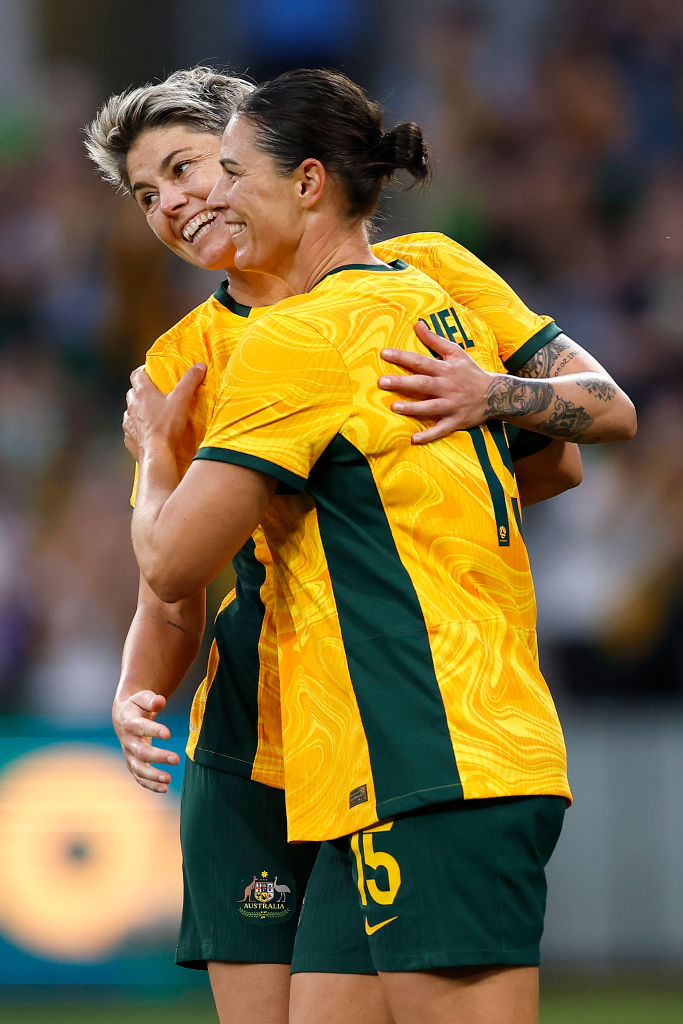 MELBOURNE, AUSTRALIA - DECEMBER 04: Michelle Heyman and Emily Gielnik of Australia celebrate the goal scored by Sharn Freier during the International Friendly match between Australia Matildas and Chinese Taipei at AAMI Park on December 04, 2024 in Melbourne, Australia. (Photo by Daniel Pockett/Getty Images)