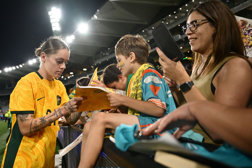 GEELONG, AUSTRALIA - DECEMBER 07: Sharn Freier of Australia signs autographs during the International Friendly Match between the Australia Matildas and Chinese Taipei at GMHBA Stadium on December 07, 2024 in Geelong, Australia. (Photo by Quinn Rooney/Getty Images)