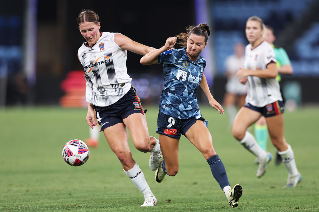 SYDNEY, AUSTRALIA - DECEMBER 14: Shea Connors of Sydney FC is challenged by Natasha Prior of the Jets during the round six A-League Women's match between Sydney FC and Newcastle Jets at Allianz Stadium, on December 14, 2024, in Sydney, Australia. (Photo by Matt King/Getty Images)